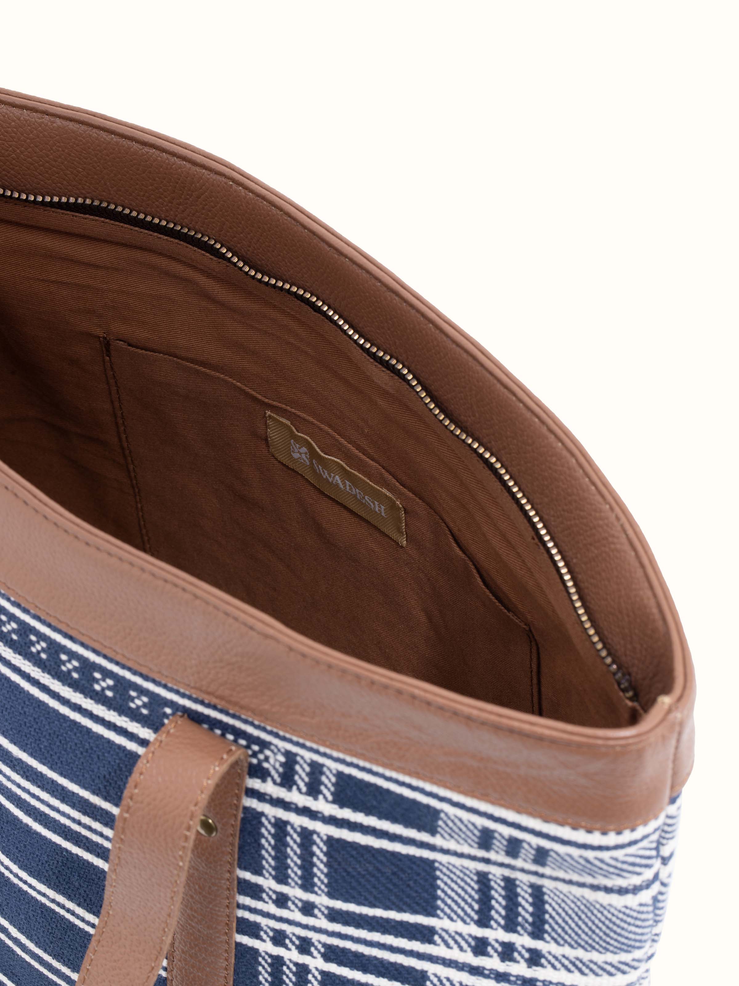 Bottom view of Leather & Textile Extra-Weft Tote Bag showing the base and construction details.