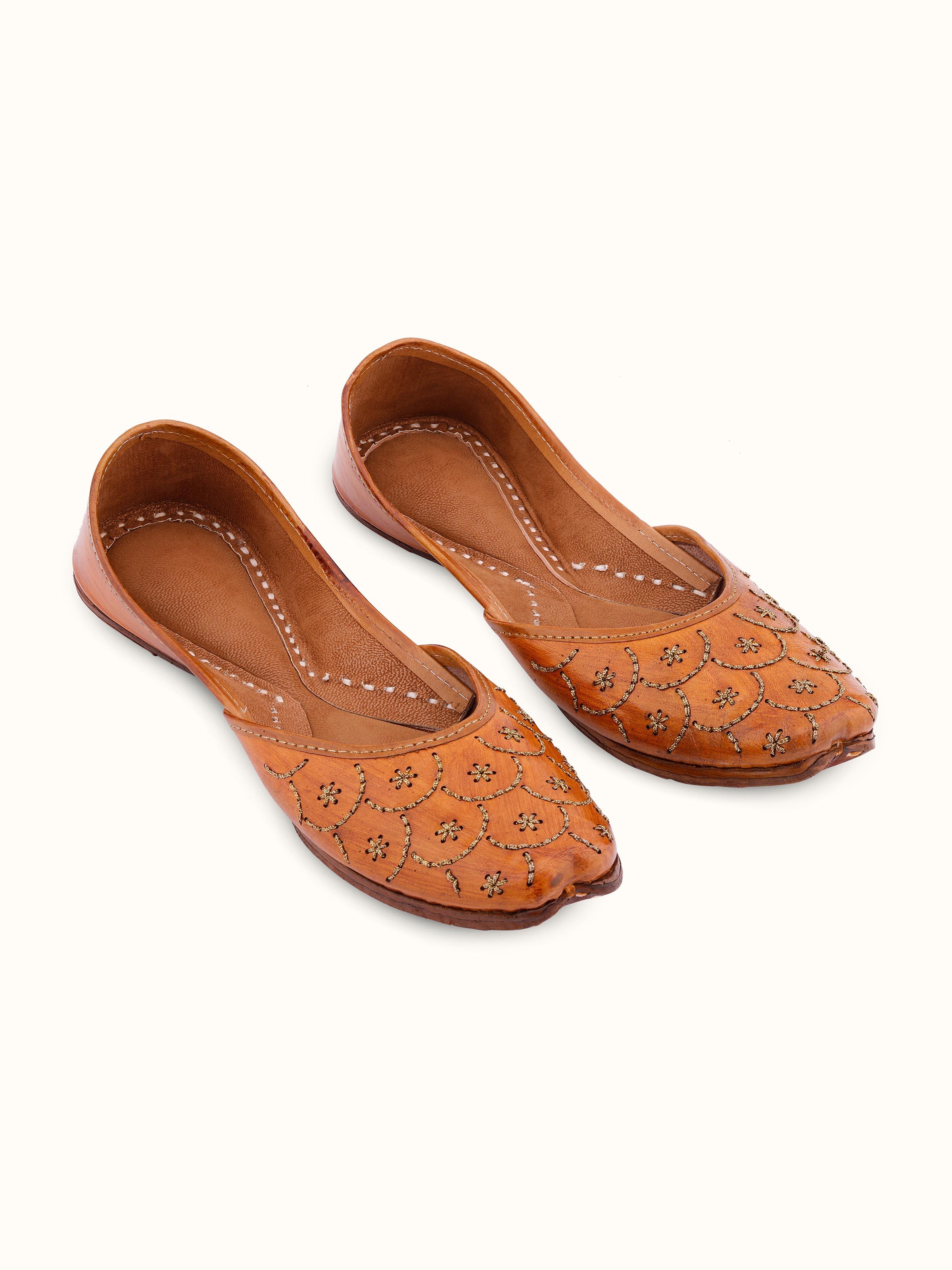 Front view of Mustard Leather Haryana Juttis showcasing traditional embroidery and design.
