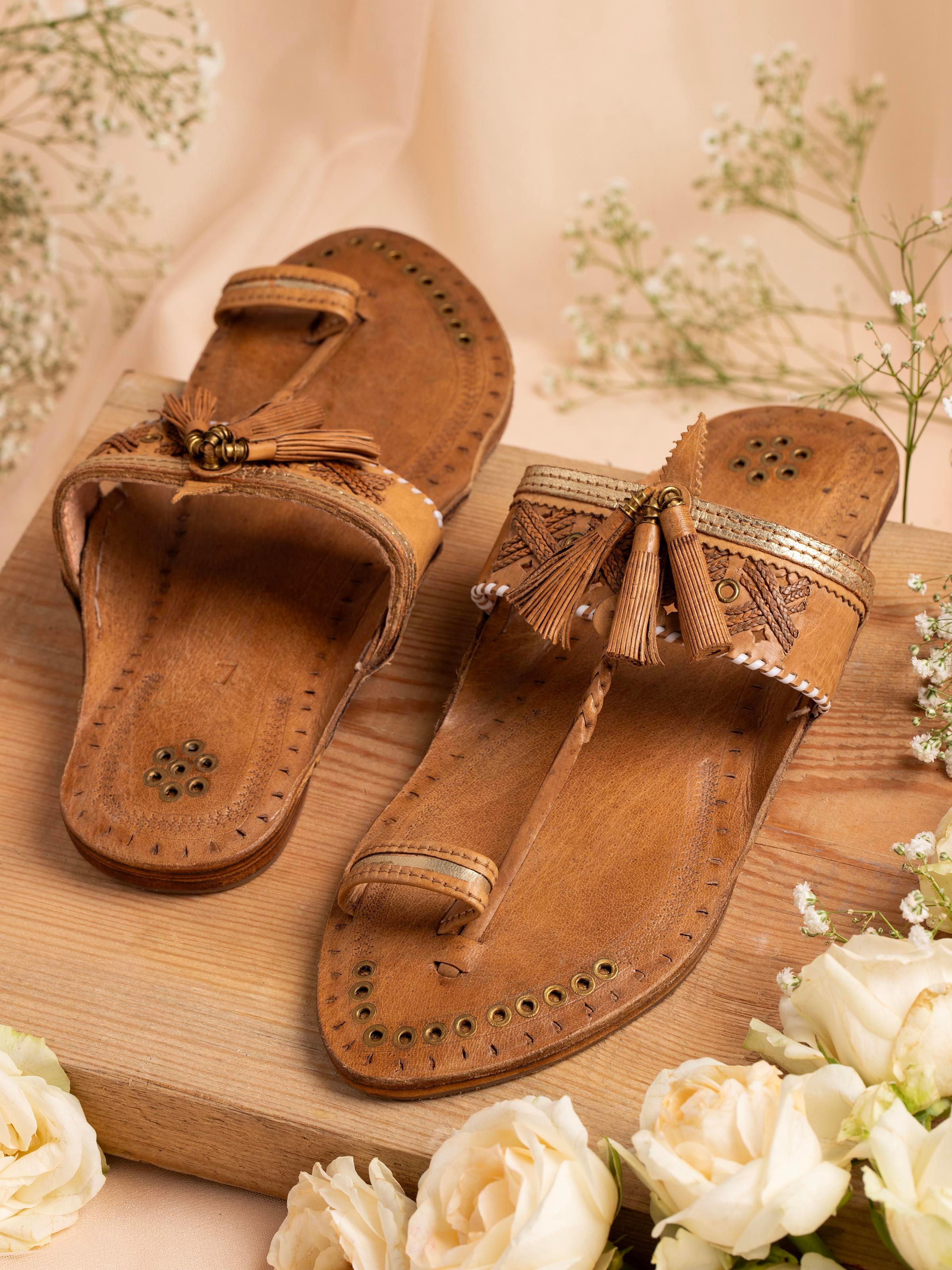 Side view of Beige Leather Kolhapuri Flat Chappals highlighting the straps and overall fit.
