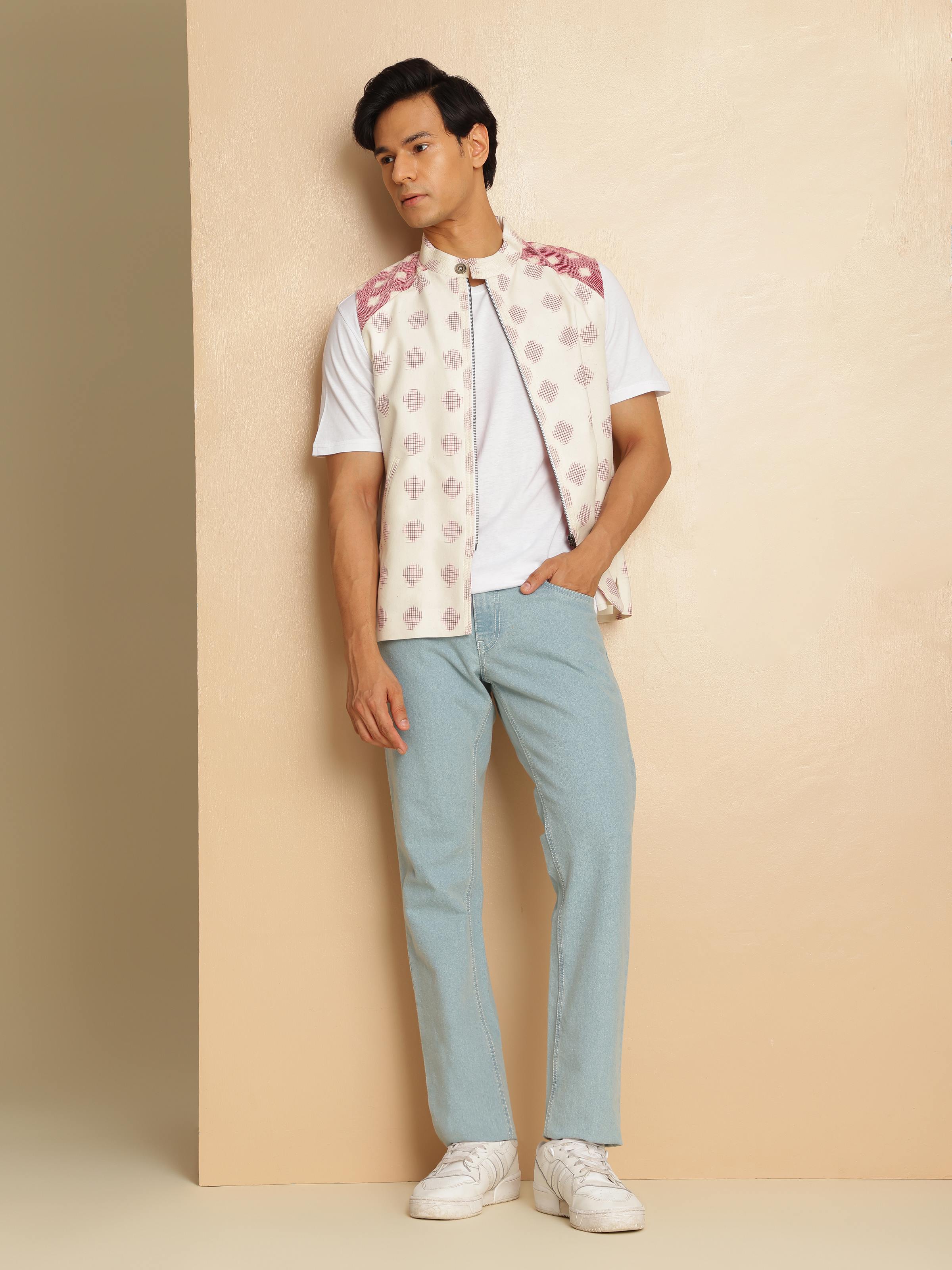 Lifestyle view of Telangana Ikat sleeveless jacket layered over kurta for a fusion look