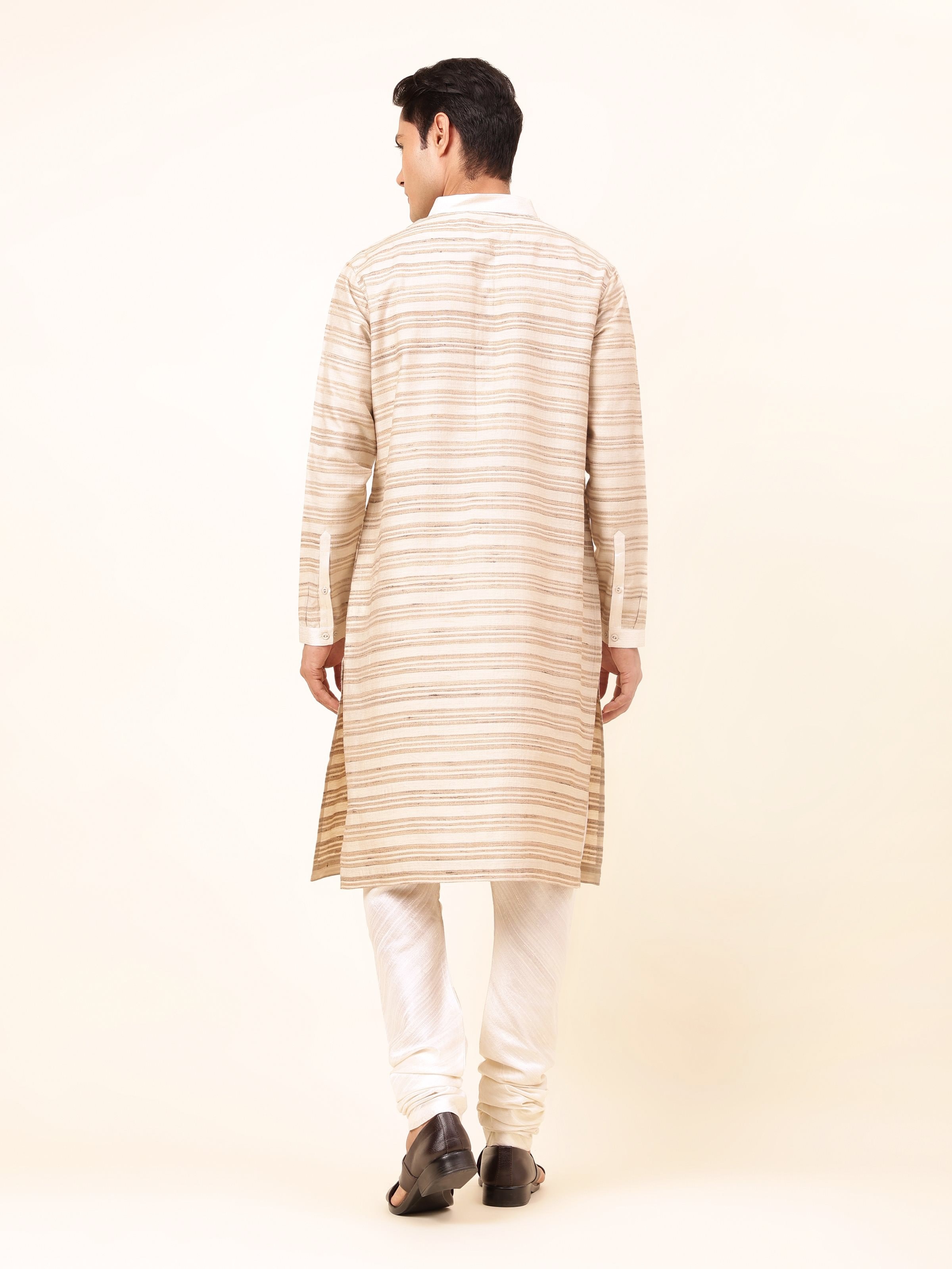 Back view of brown Tussar silk long kurta, showing clean stitching and elegant fall of the fabric.