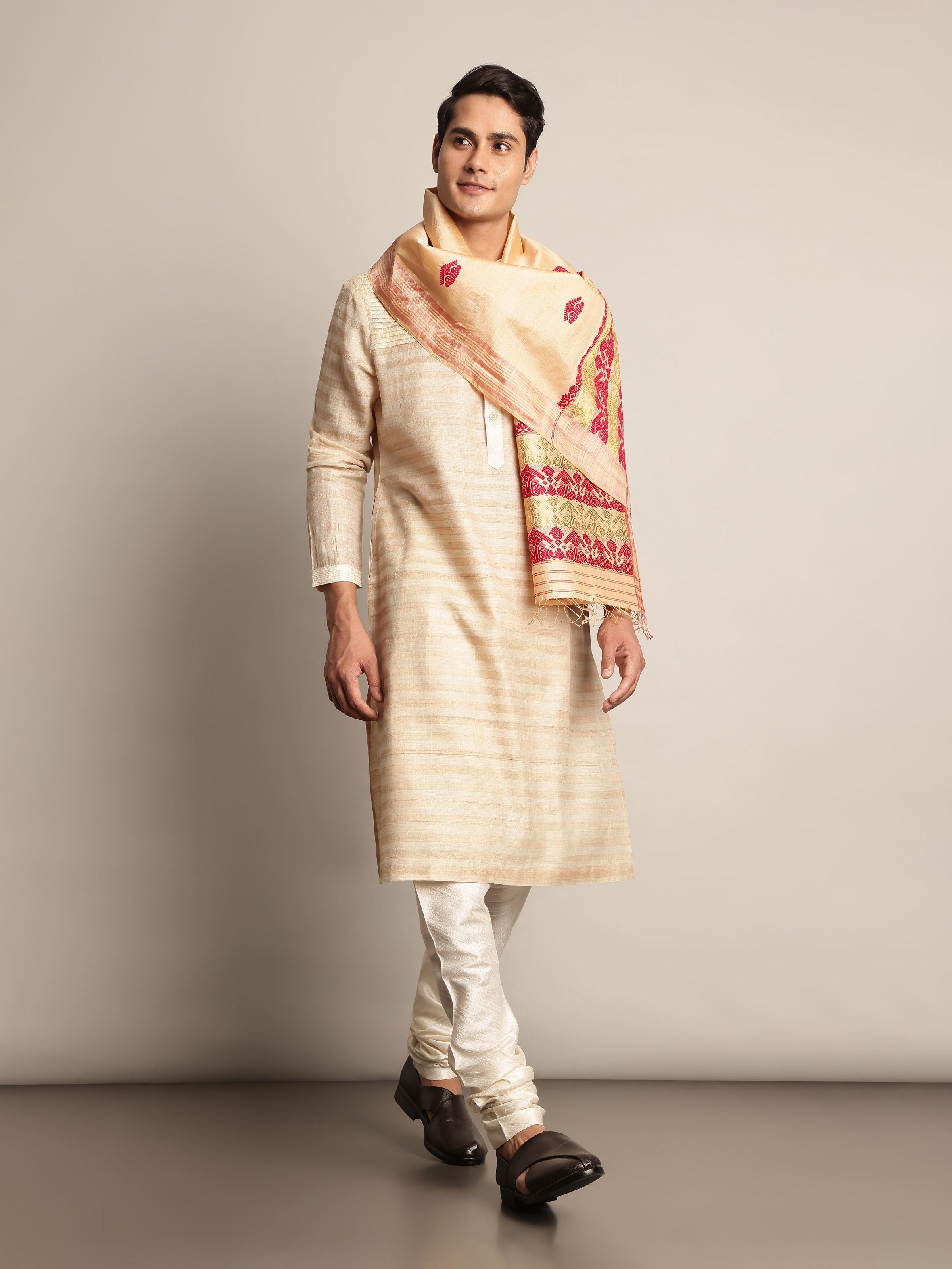 Lifestyle image showing the kurta's elegant fall and natural sheen.