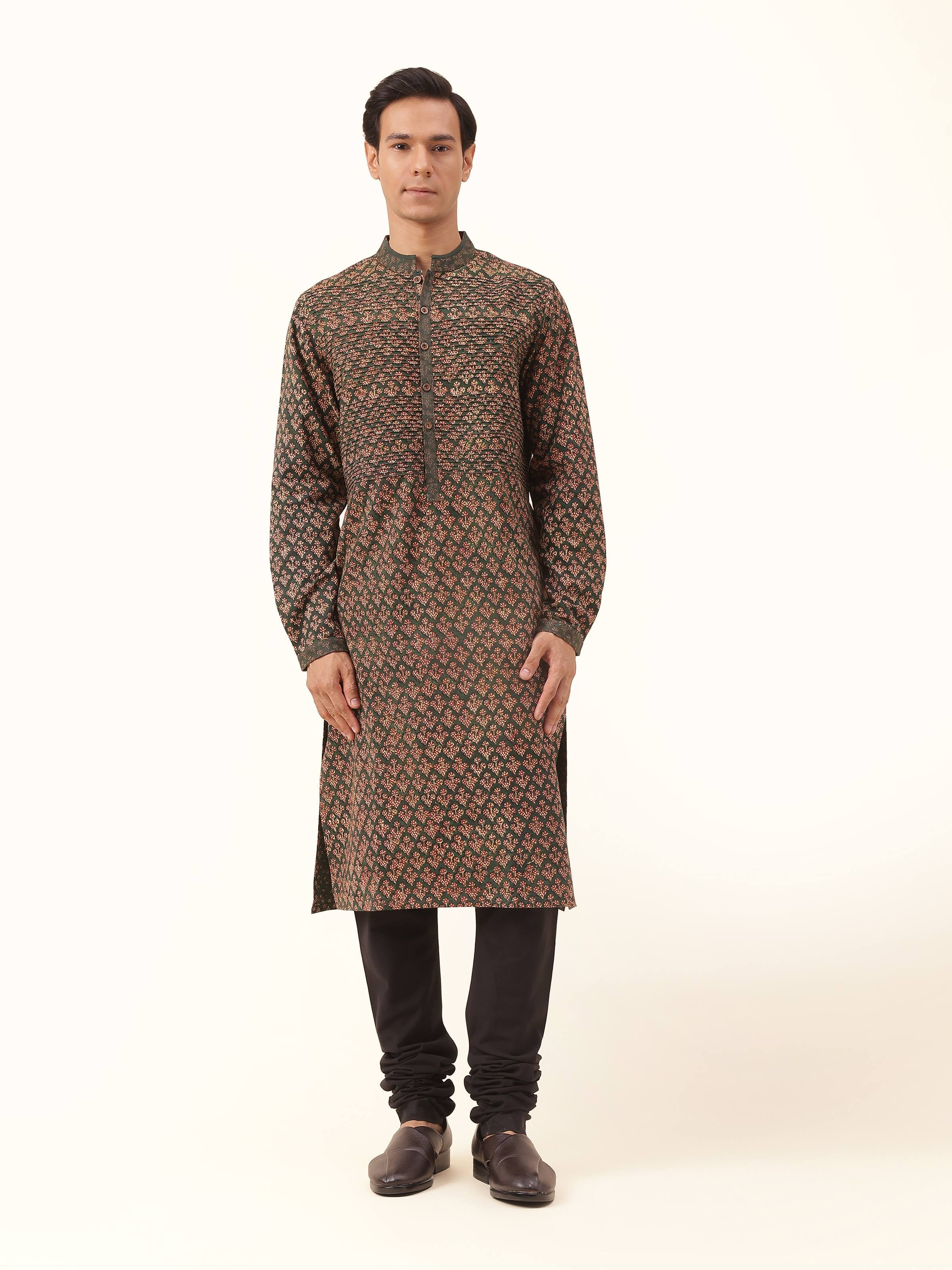 Front view of the teal cotton long kurta with traditional Phad block print, showcasing its vibrant hue and artisanal appeal.