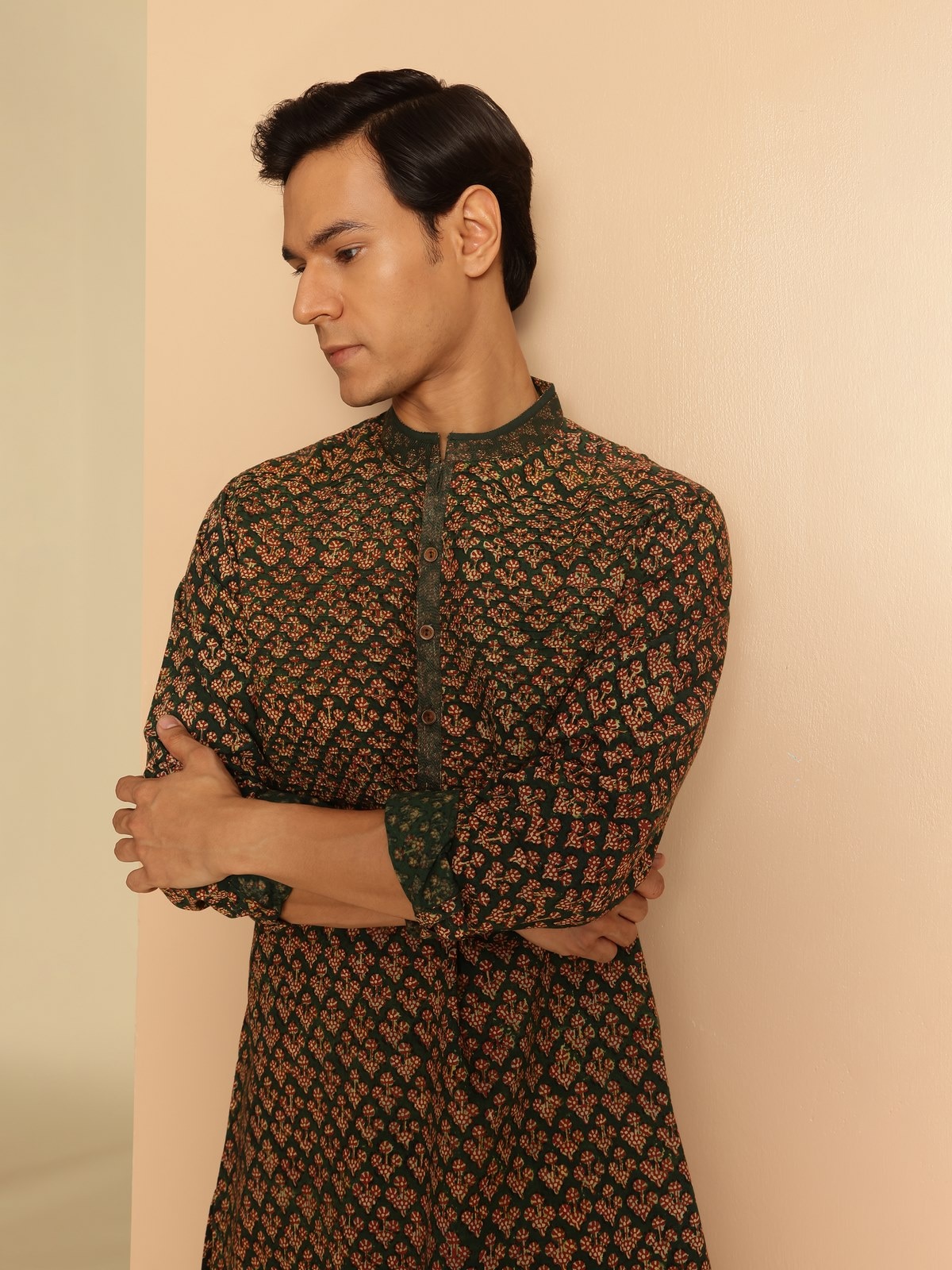 Side profile showing the flattering long silhouette and timeless style of this statement piece.