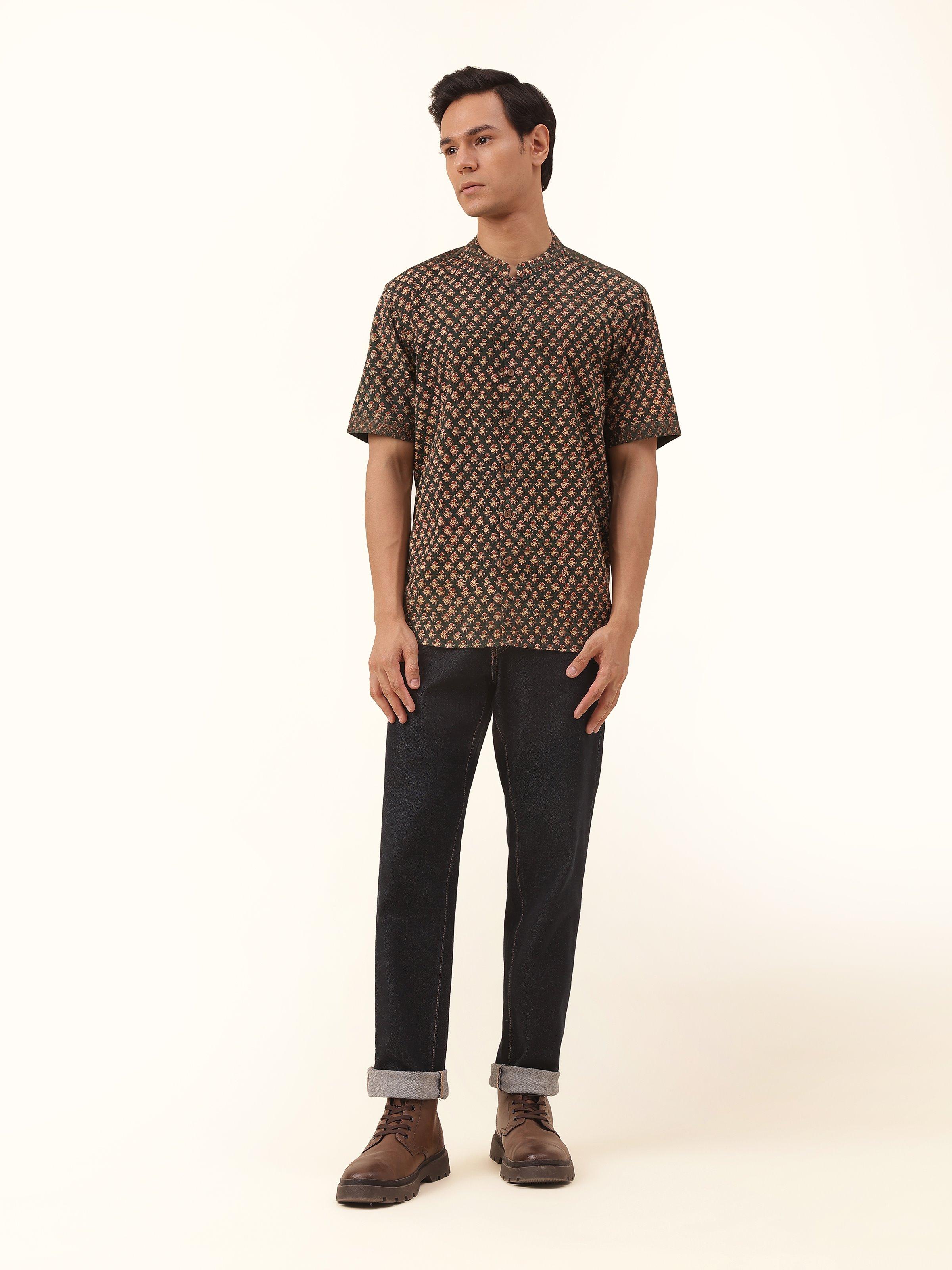 Front view highlighting the vibrant teal color and traditional hand block print of this pure cotton shirt.