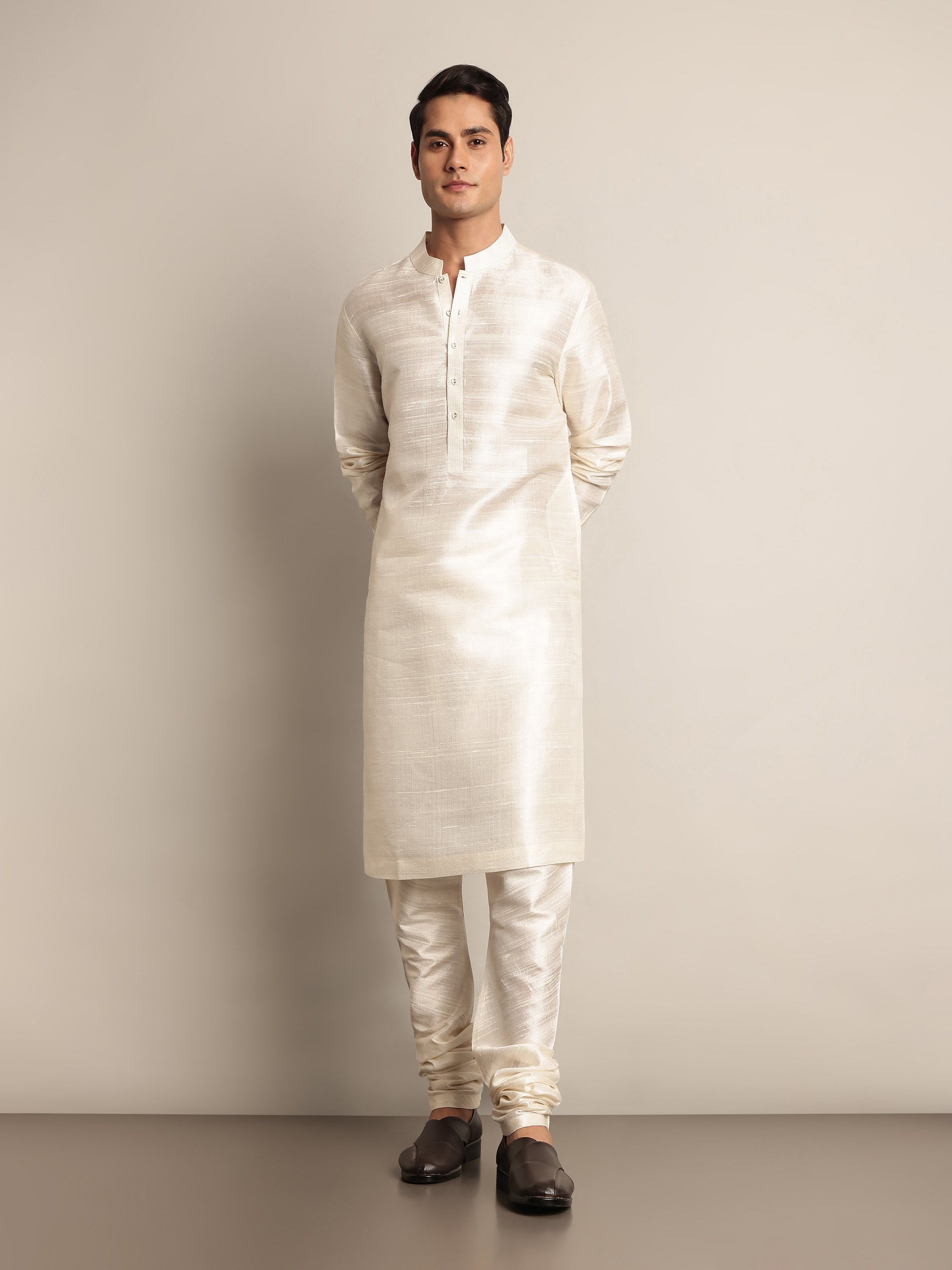 Lifestyle view of off-white silk long kurta styled with dupatta for a refined ethnic look