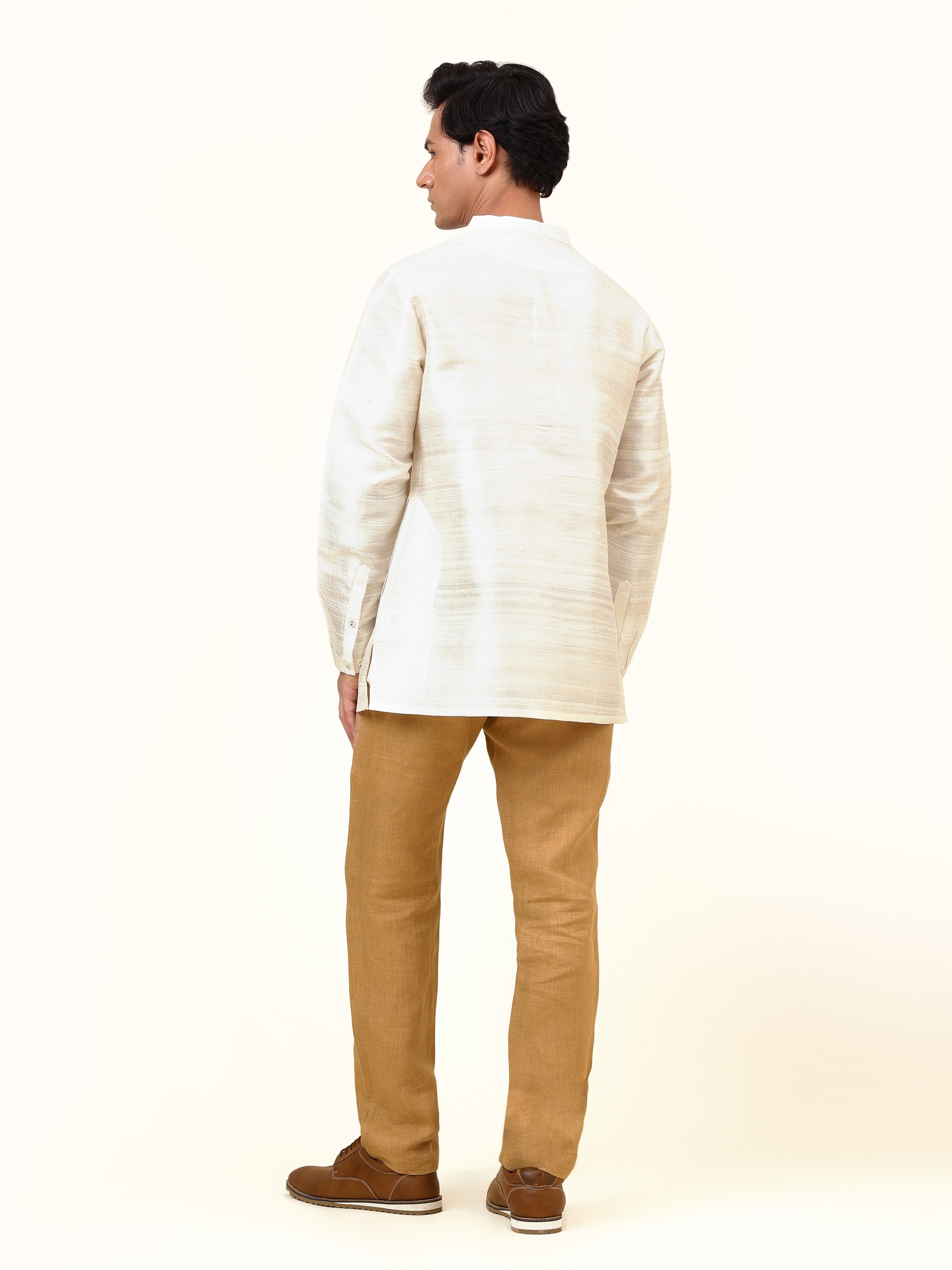 Back view of off-white mulberry silk kurta highlighting clean finish and back pleat