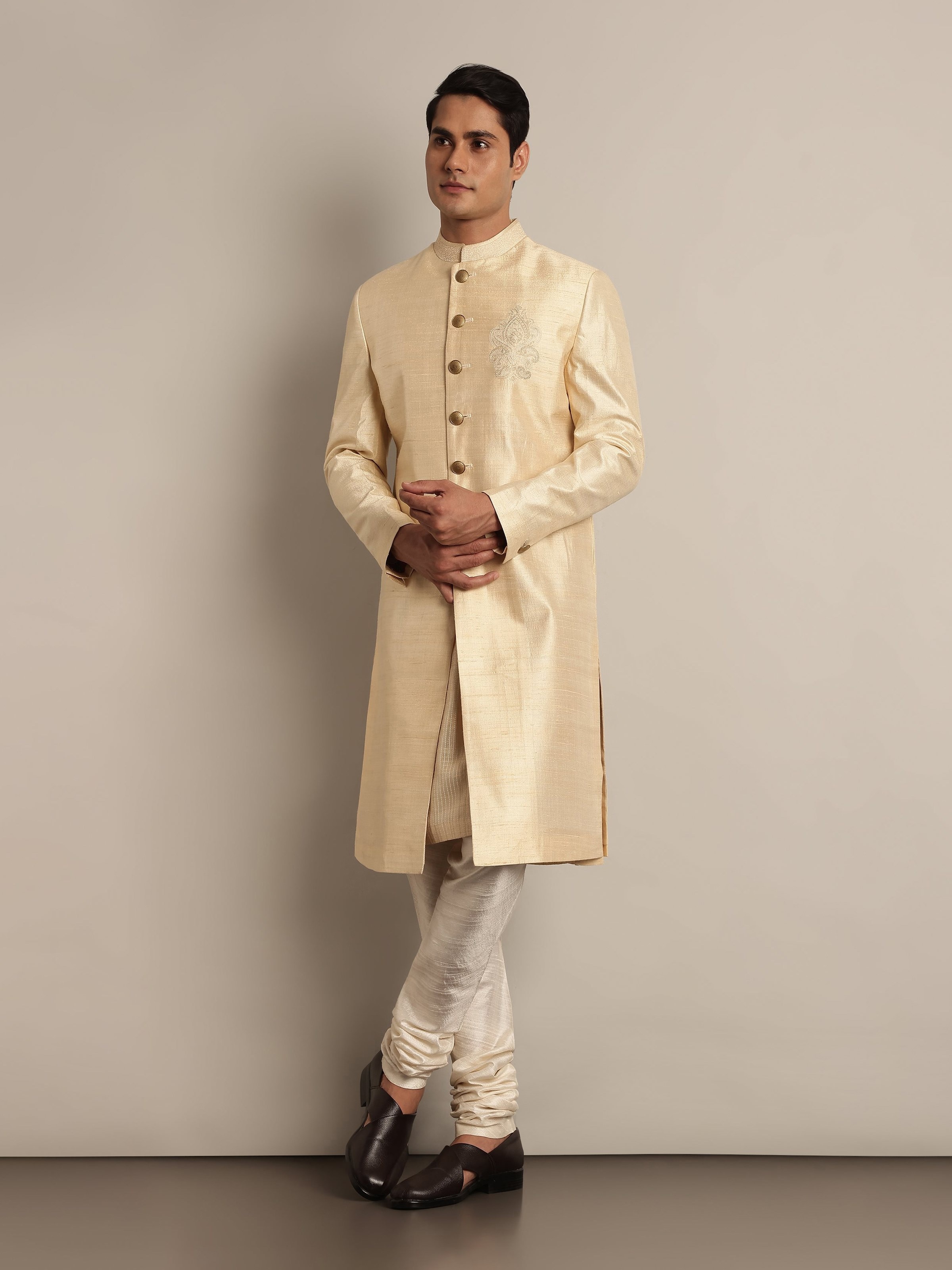 Lifestyle view of Off-white Mulberry Silk Embroidered Sherwani worn elegantly highlighting fine embroidery