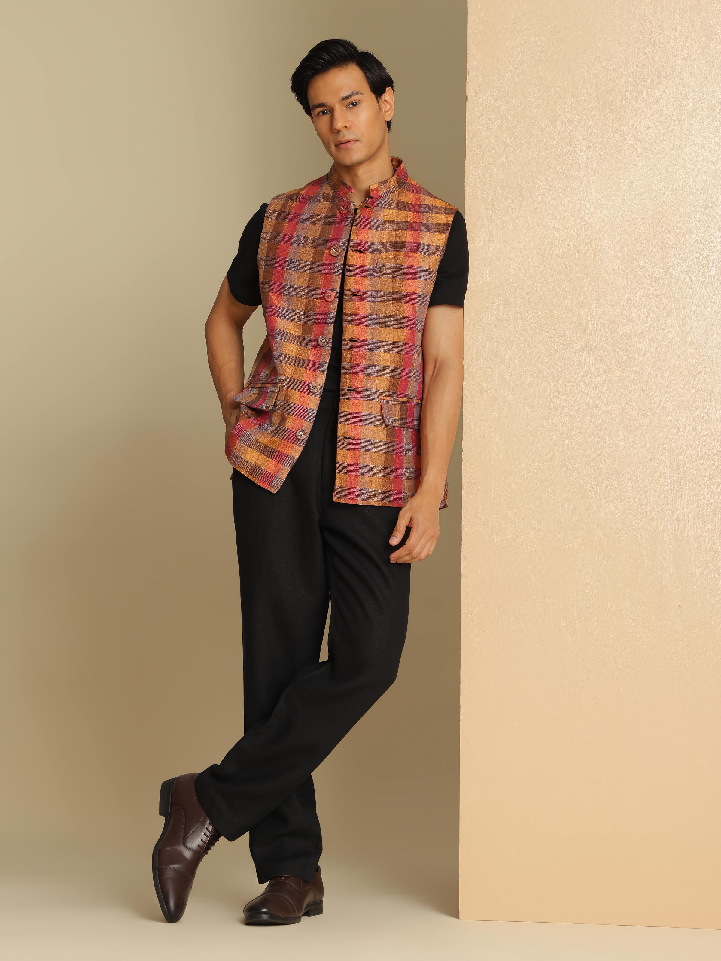 Lifestyle image that brings out the smart, sleeveless cut and rich hue.