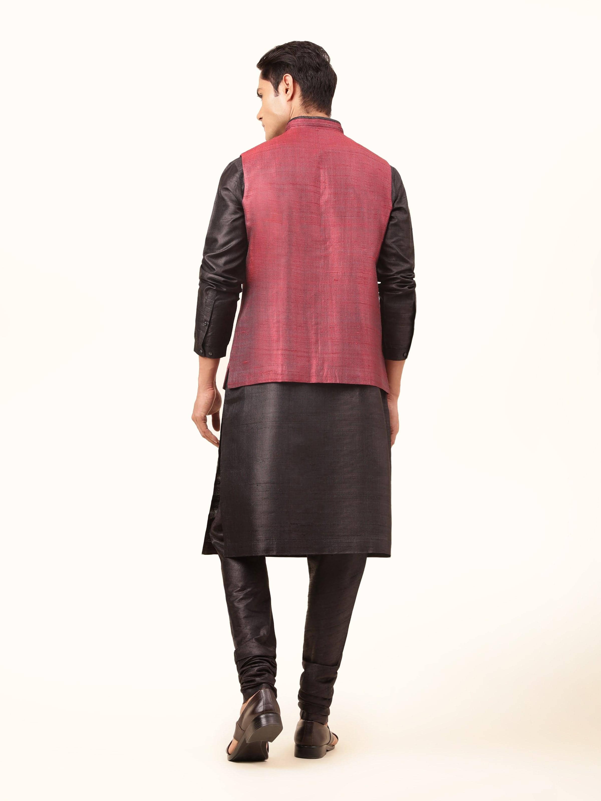 Back view highlighting the neat tailoring and timeless appeal.