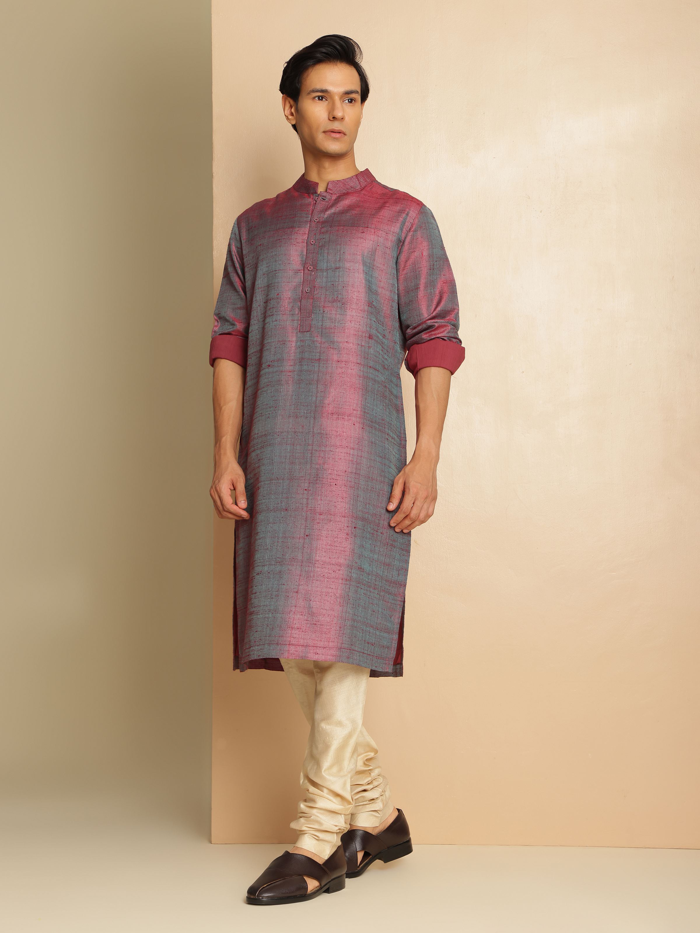 Lifestyle shot highlighting the kurta’s flattering silhouette and rich color.