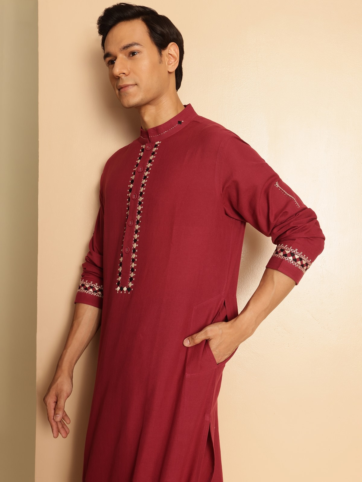 Alternate lifestyle view of maroon kurta highlighting embroidery and soft cotton fabric