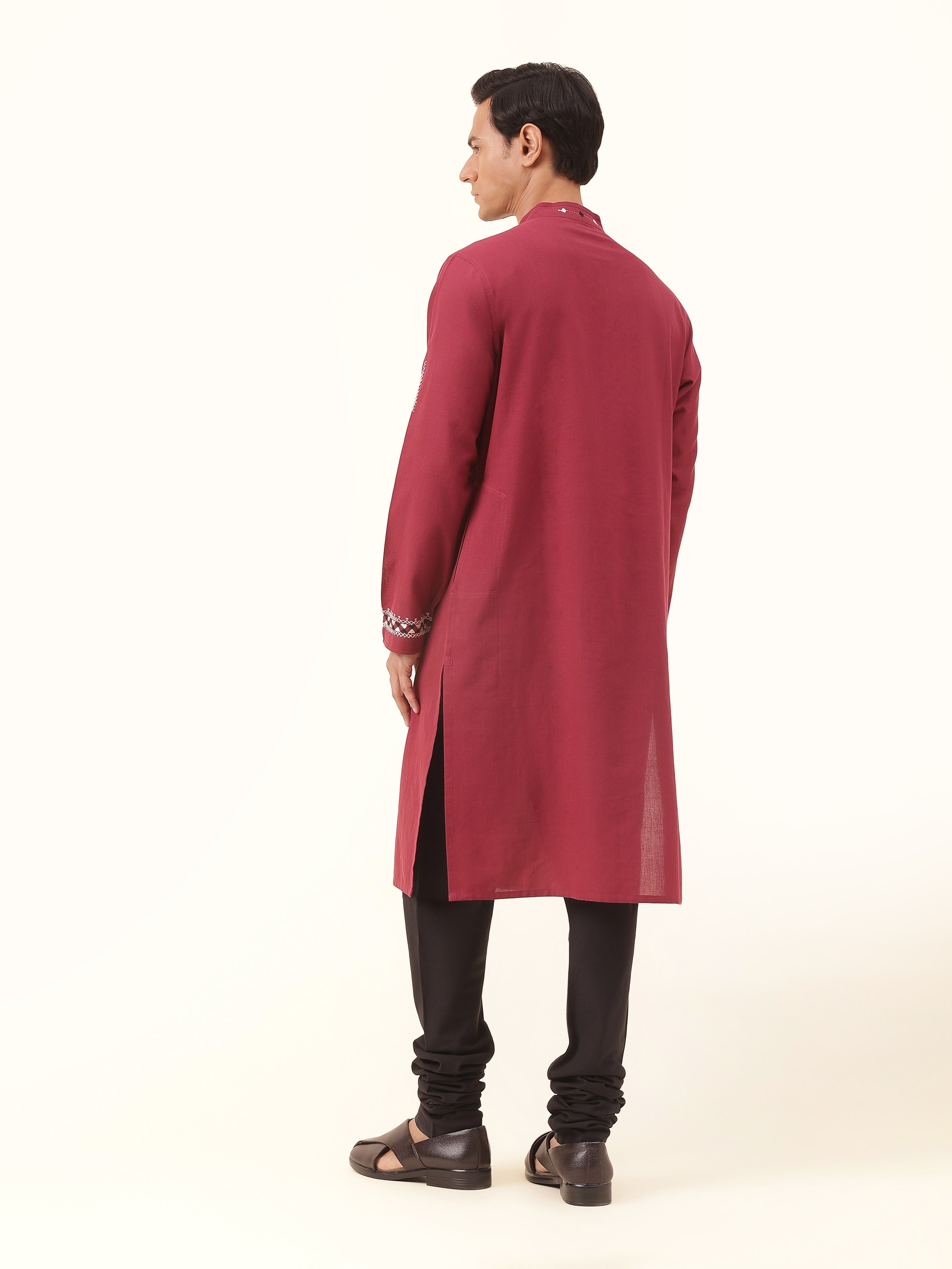 Back view of maroon embroidered cotton kurta with clean finish and minimal back panel design