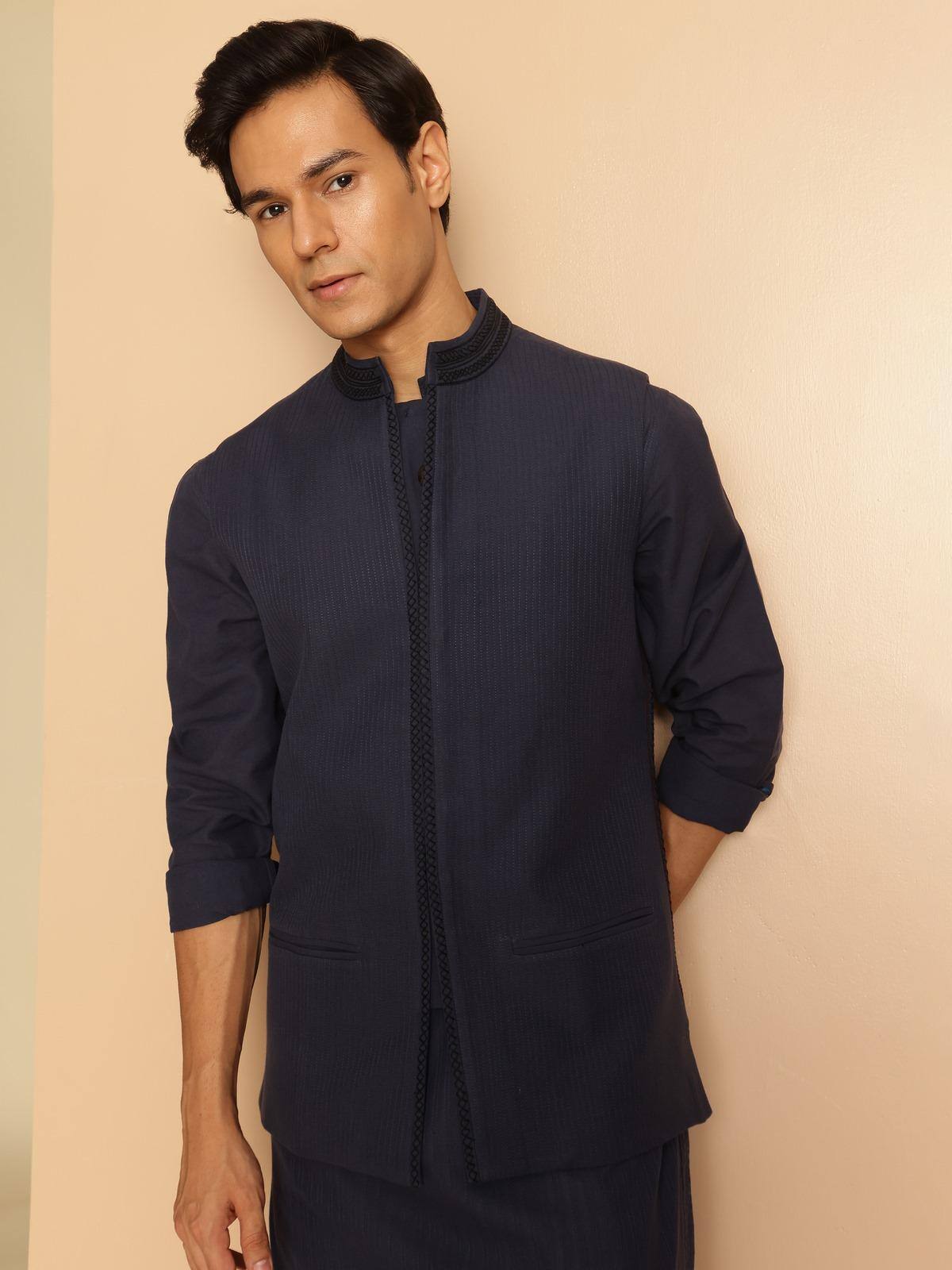 Navy blue cotton Soof embroidered sleeveless jacket angled view highlighting embroidery detail and fabric finish