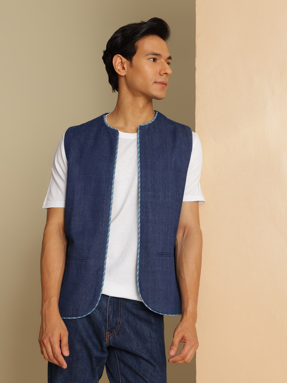 Angled view highlighting open front design and texture details of the jacket