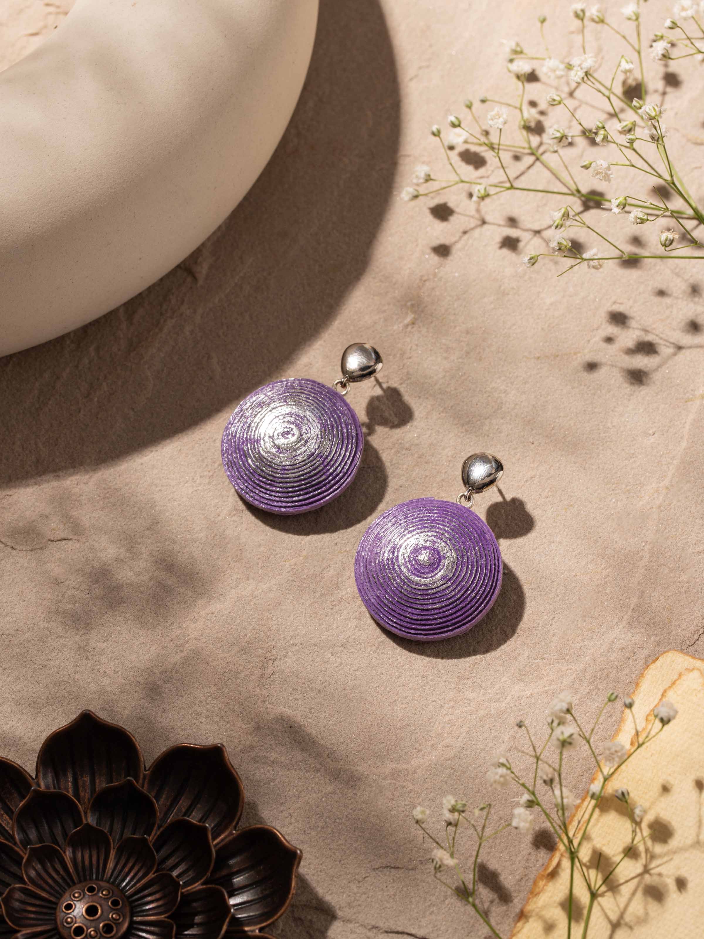 Side view of Blue Meenakari silver hoop earrings showcasing detailed enamel design.