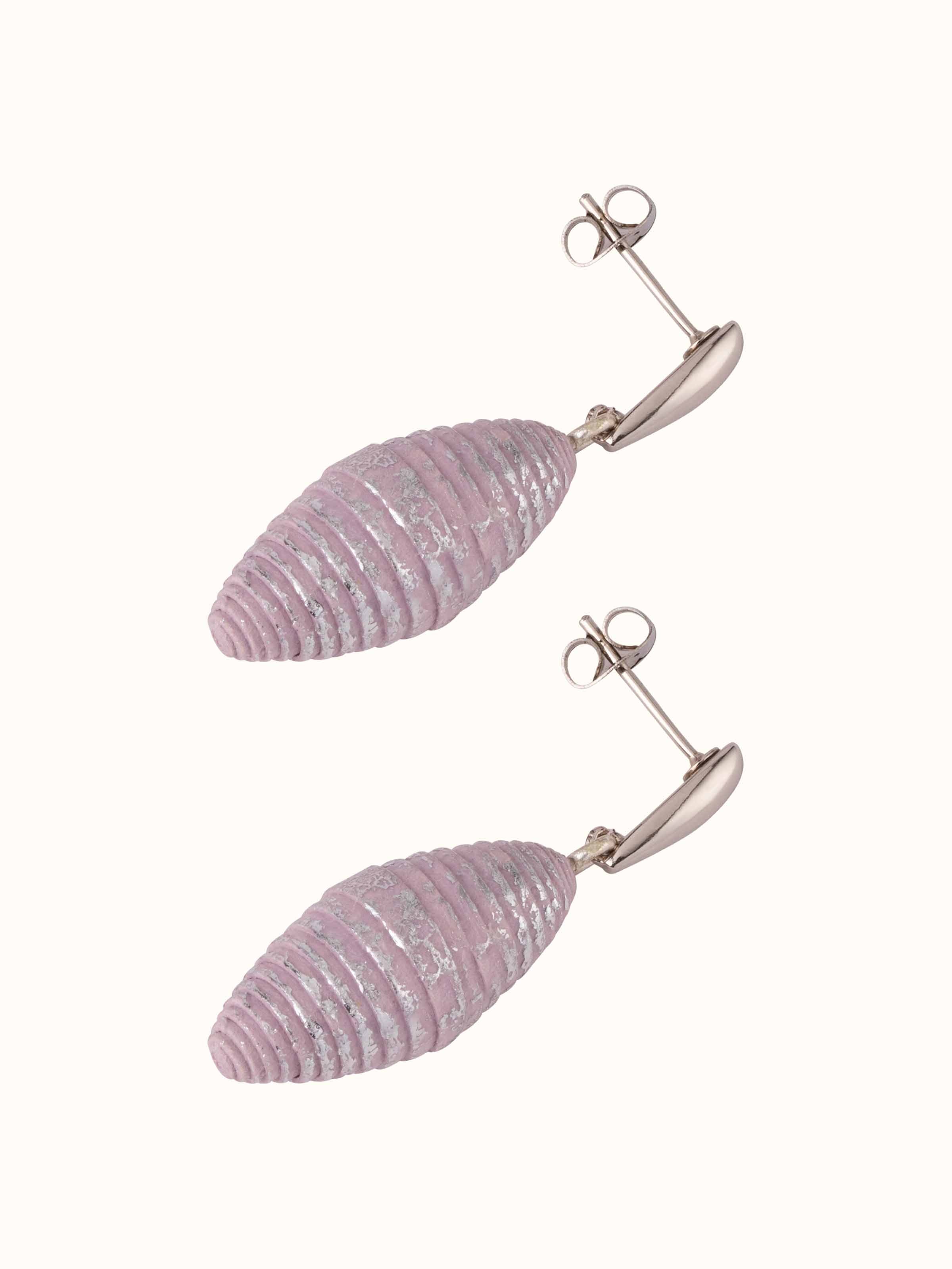 Angled view of Paper Drop Earrings showcasing the stylish drop and detailed paper design.