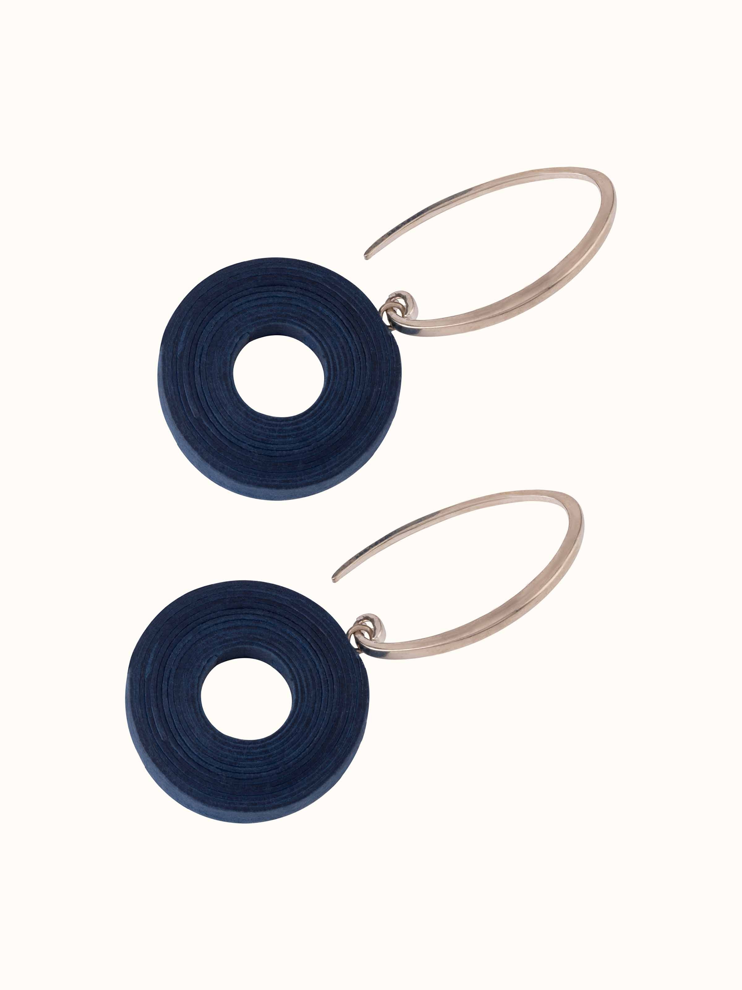 Angled view of Paper Drop Earrings displaying the detailed texture and stylish finish.
