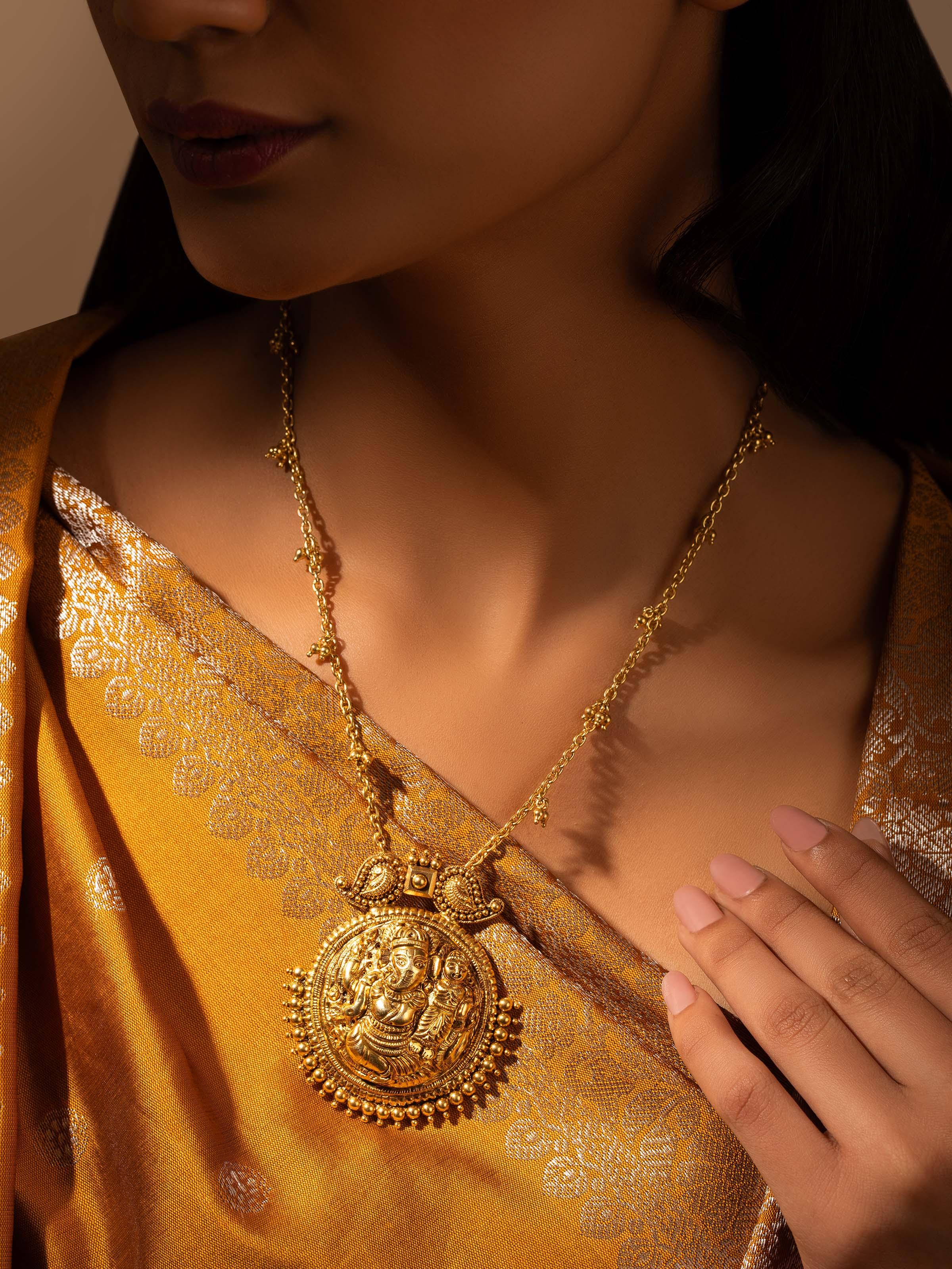 Close-up view of tribal silver long necklace highlighting intricate details.