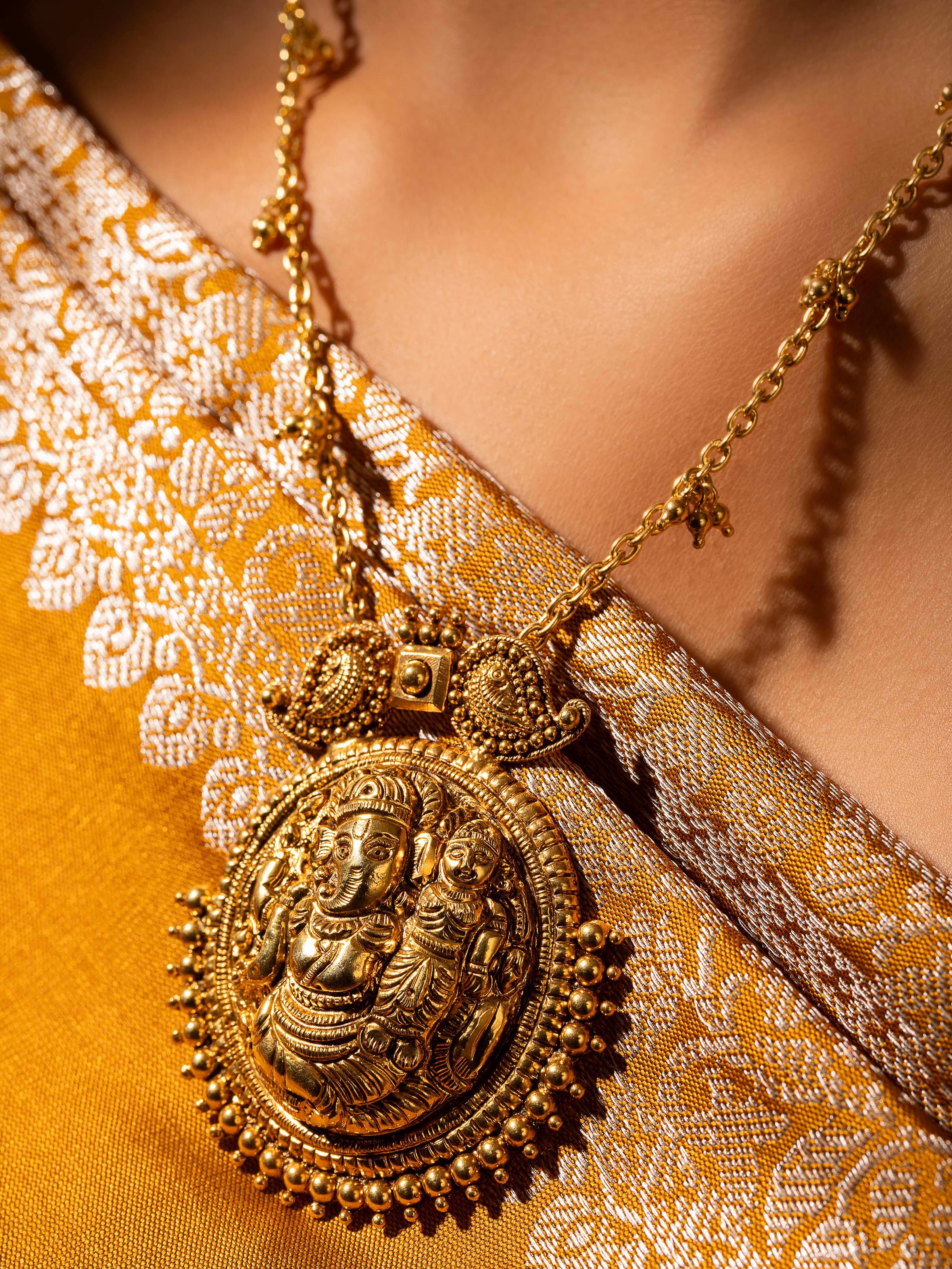 Side view of tribal silver long necklace showcasing its detailed craftsmanship.