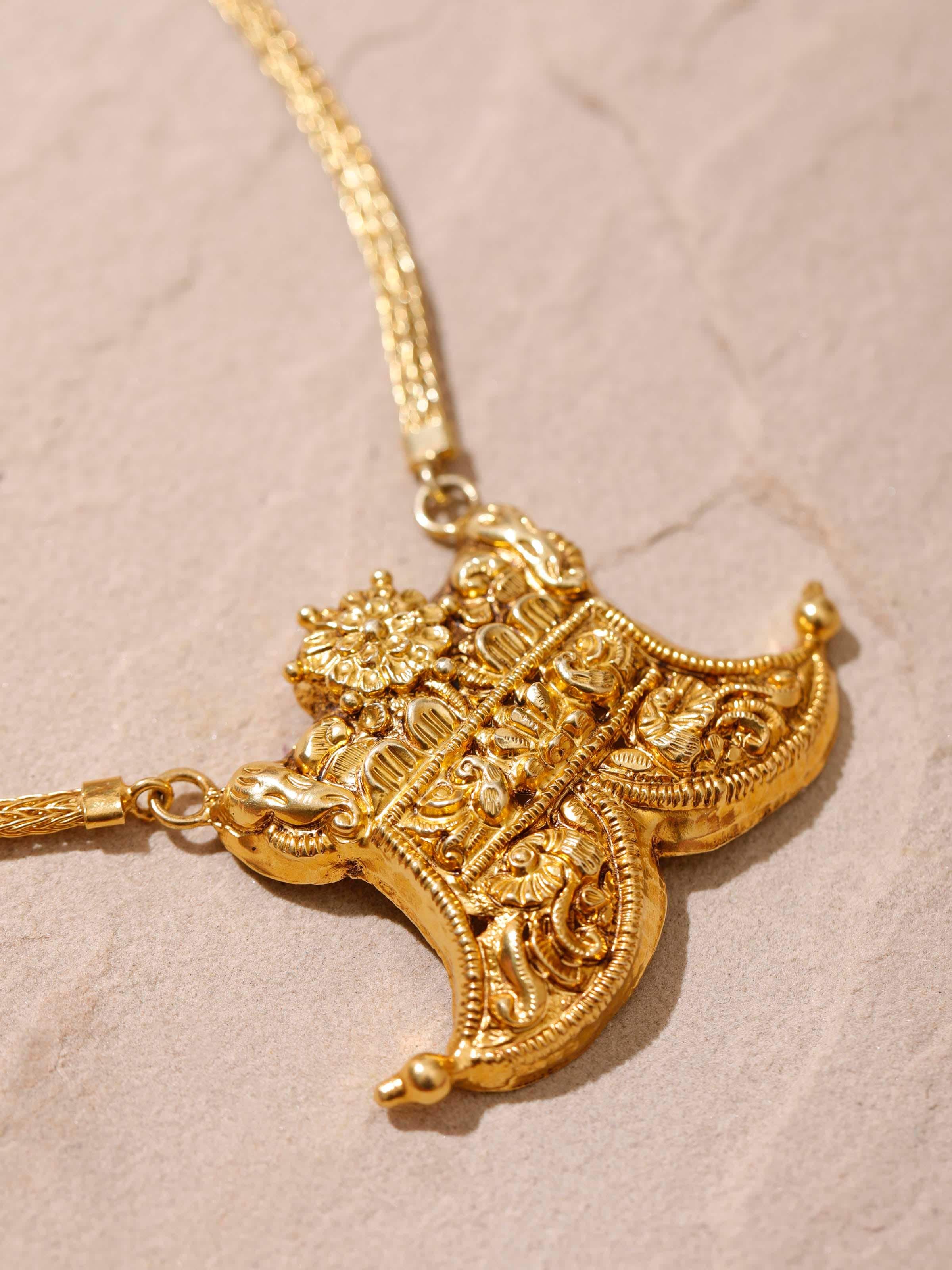 Detailed image of Nakash Silver Long Necklace focusing on the polished silver surface and elegant design.