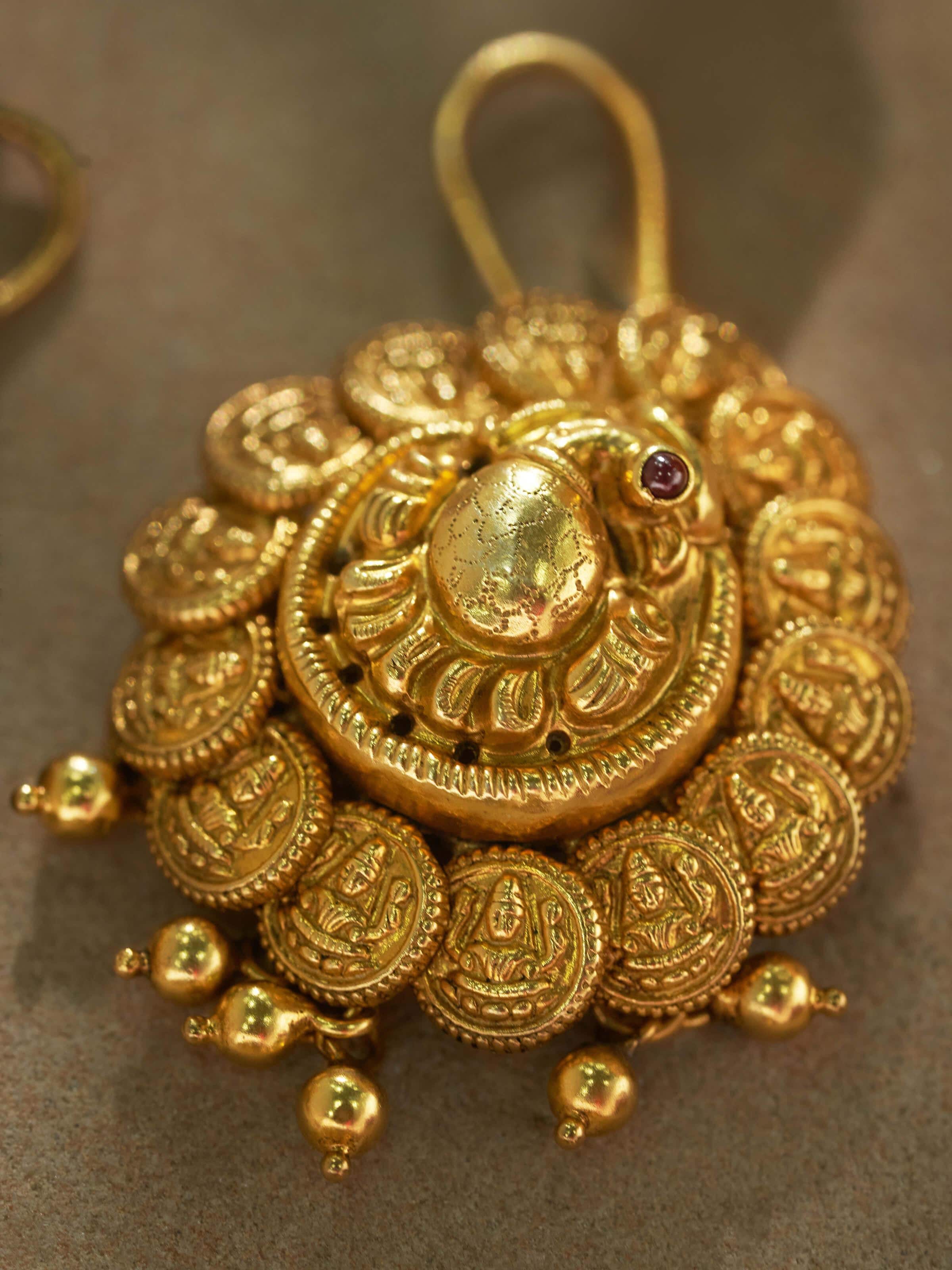 Side view of Nakash Silver Jhumkas showcasing the elegant drop length and detailed craftsmanship.