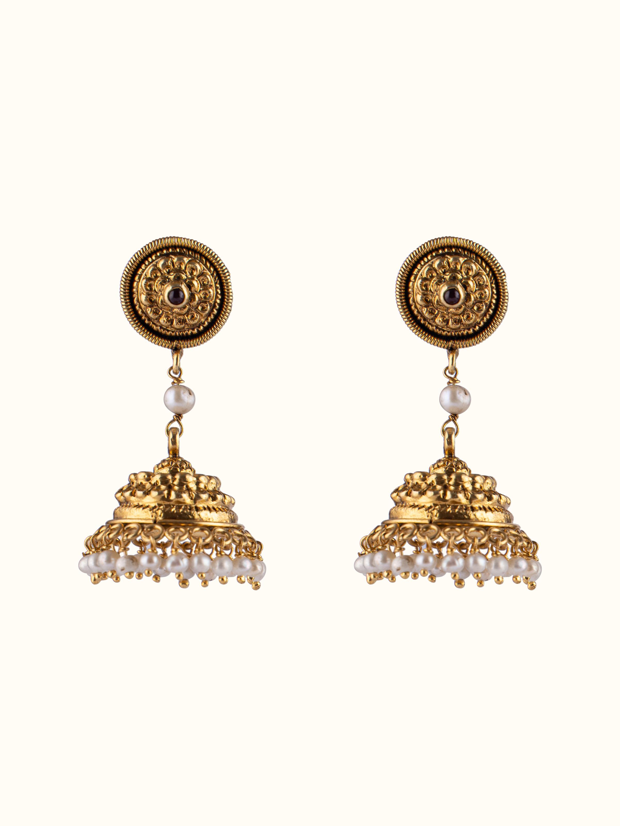 Front view of Nakash silver jhumka earrings highlighting traditional design