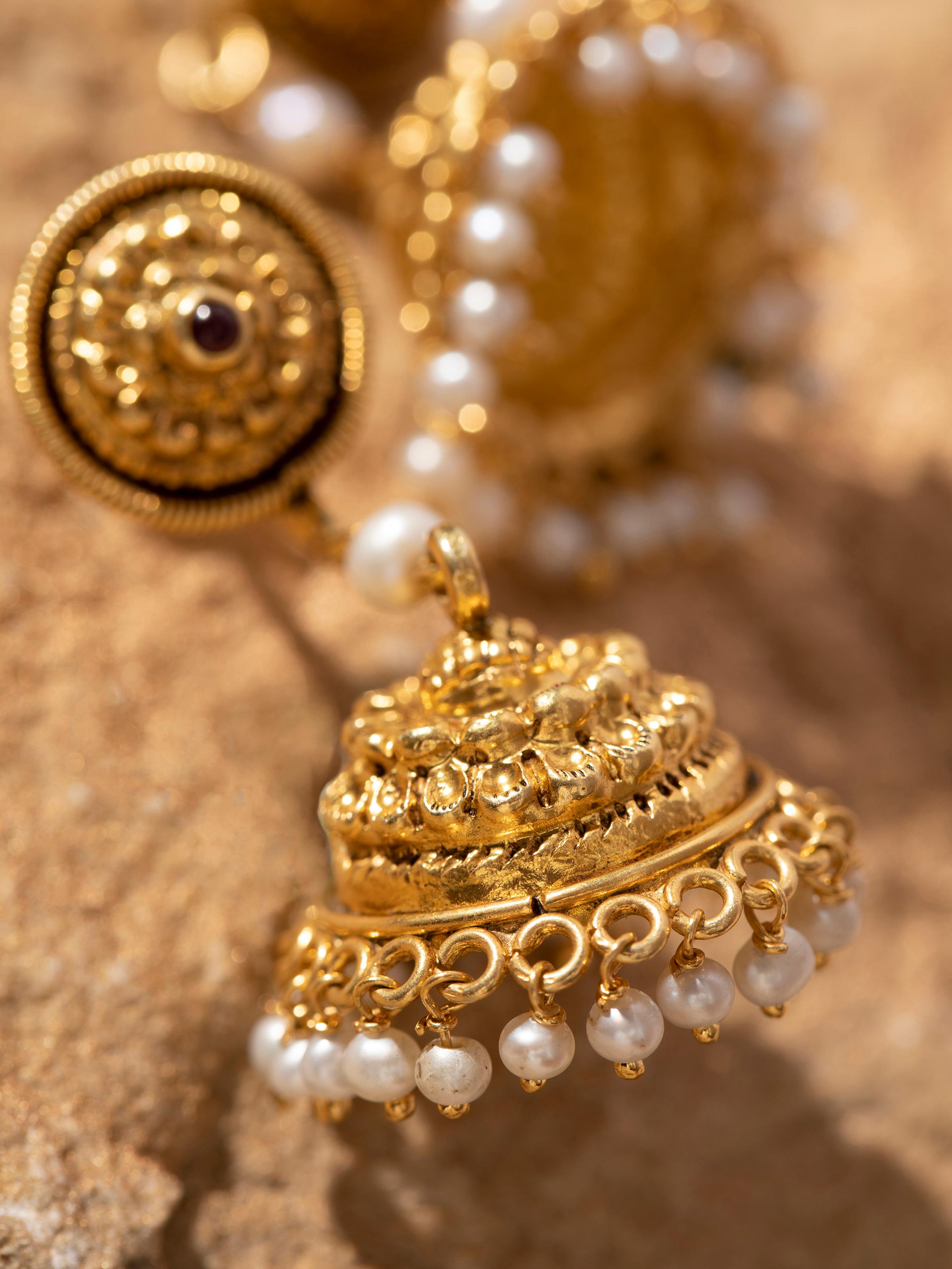 Detailed image of Nakash silver jhumka earrings highlighting craftsmanship and style