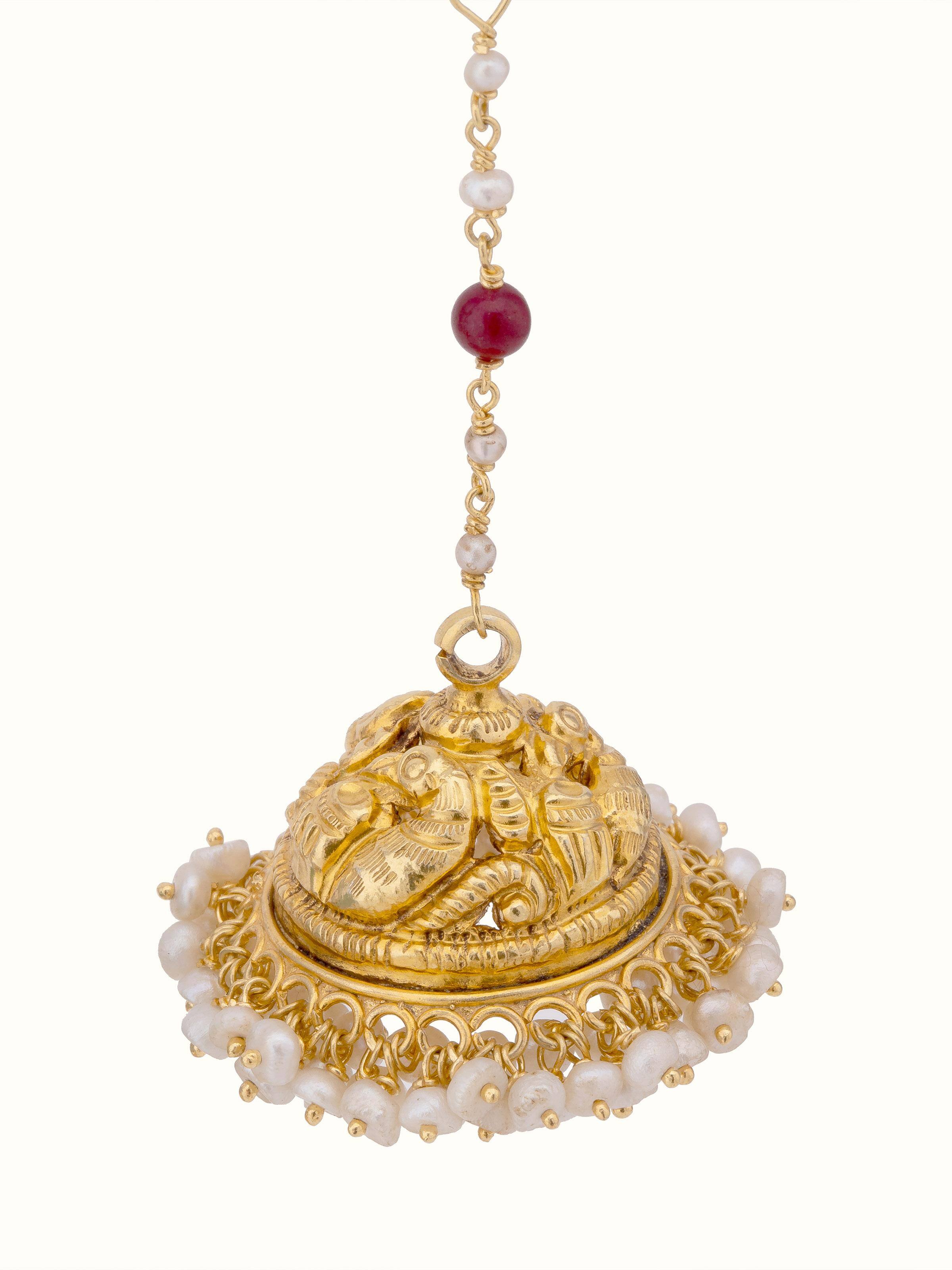 "Overhead view of Nakash silver jhumka earrings displaying elegant design"