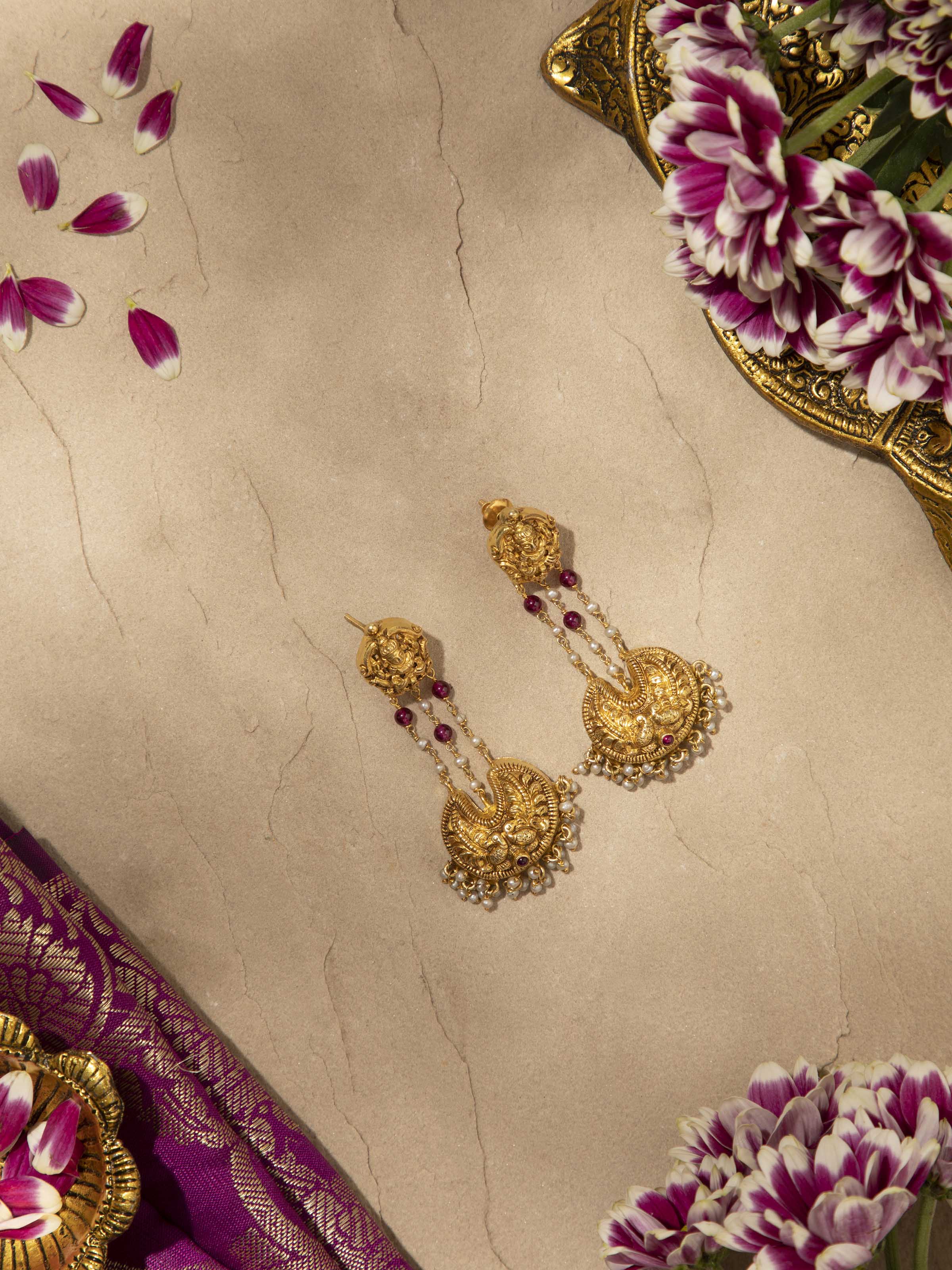 Back view of Nakash Silver Drop Earrings showing the smooth finish and secure earring fastening.