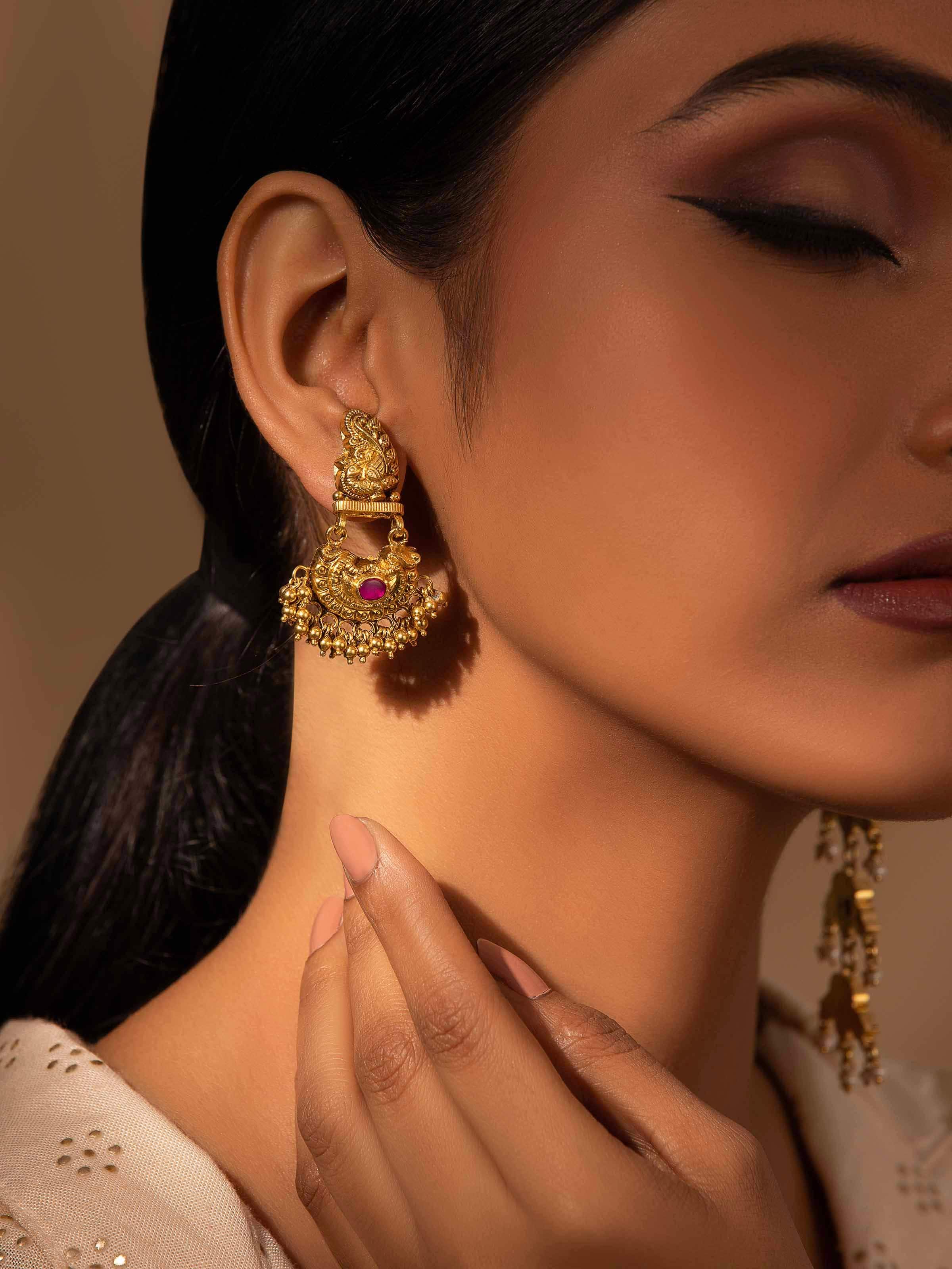 Side view of Nakash Silver Drop Earrings highlighting the fine silver craftsmanship and stylish drop design.