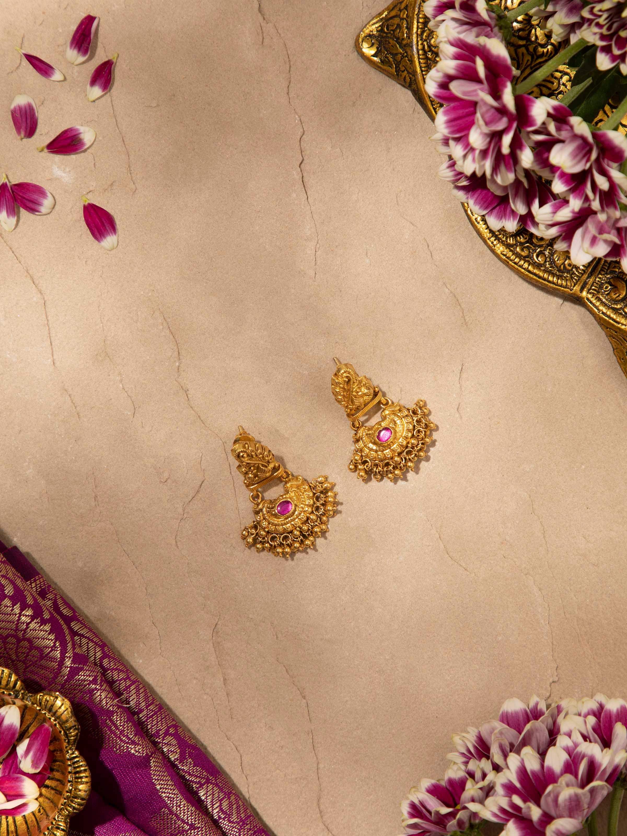 Back view of Nakash Silver Drop Earrings showing the smooth finish and secure earring fastening.