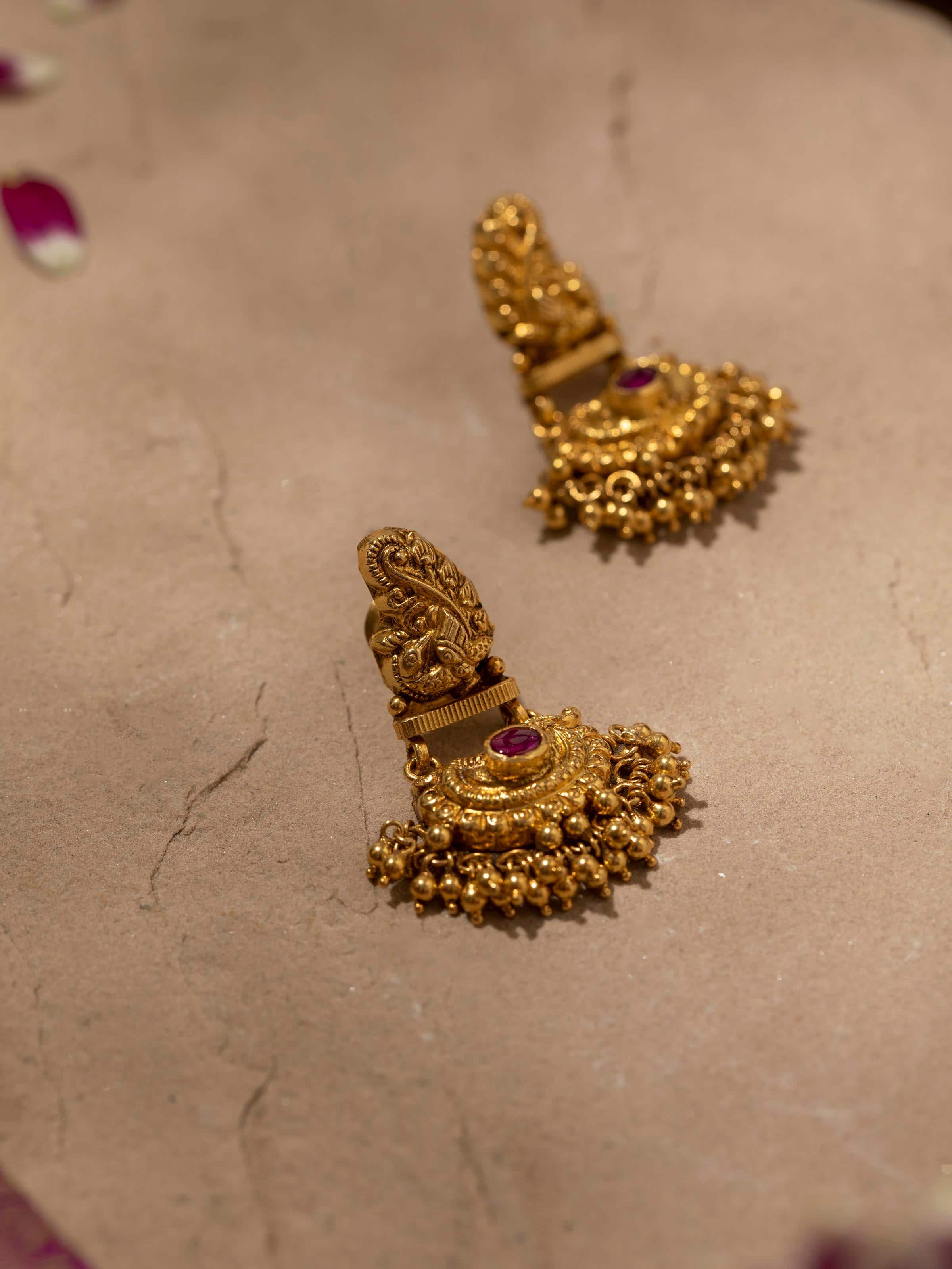 Overhead view of Nakash Silver Drop Earrings featuring intricate silver design and elegant drop style.