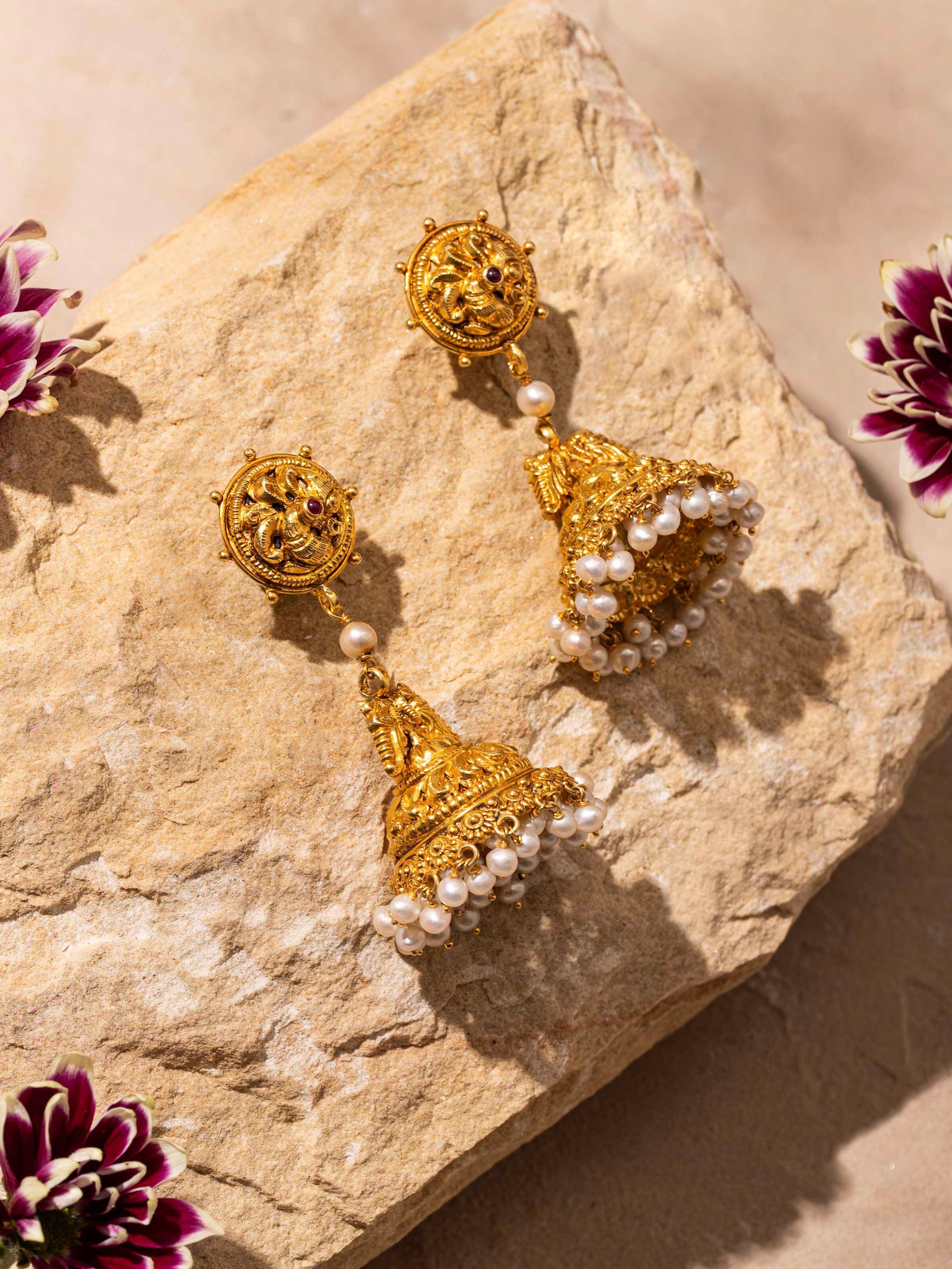 Side view of Nakash Silver Jhumka Earrings highlighting the elegant shape and fine detailing.