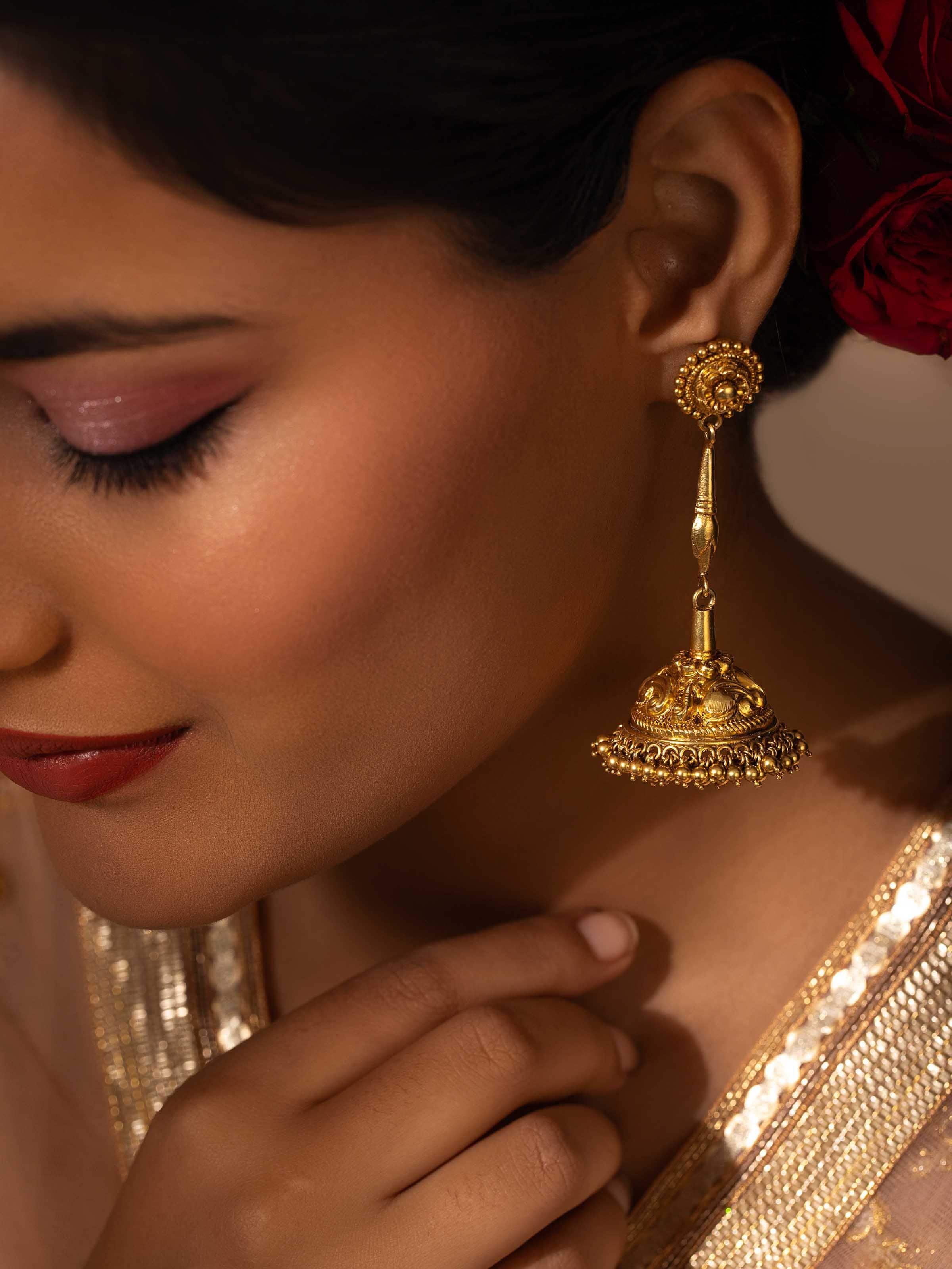 Close-up of Nakash Silver Jhumkas highlighting the detailed silver work and craftsmanship.