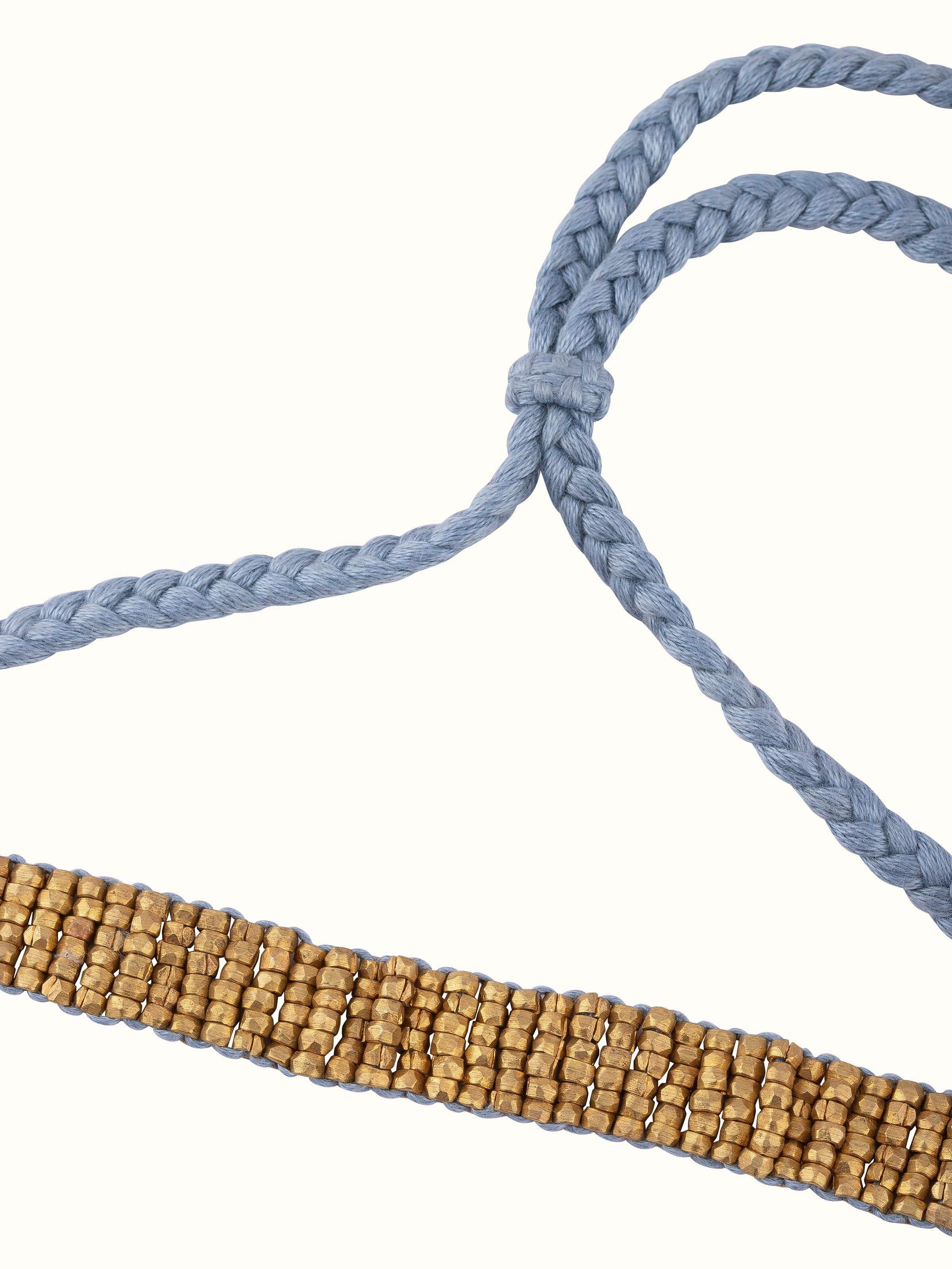 Angled view of Dhokra Long Necklace showcasing elegant design and traditional style.