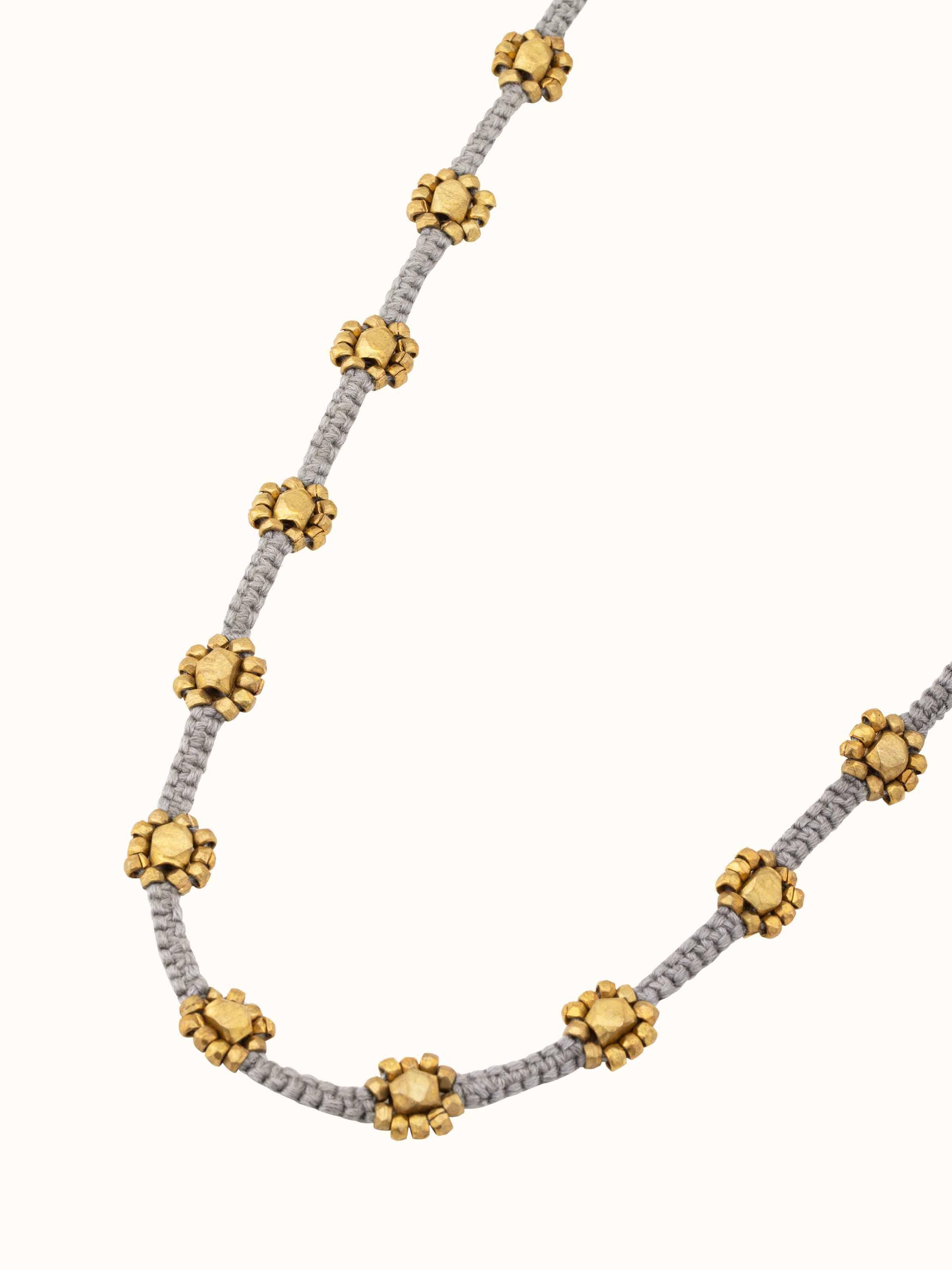 Back view of Dhokra Long Necklace showing the smooth finish and secure clasp of the necklace.