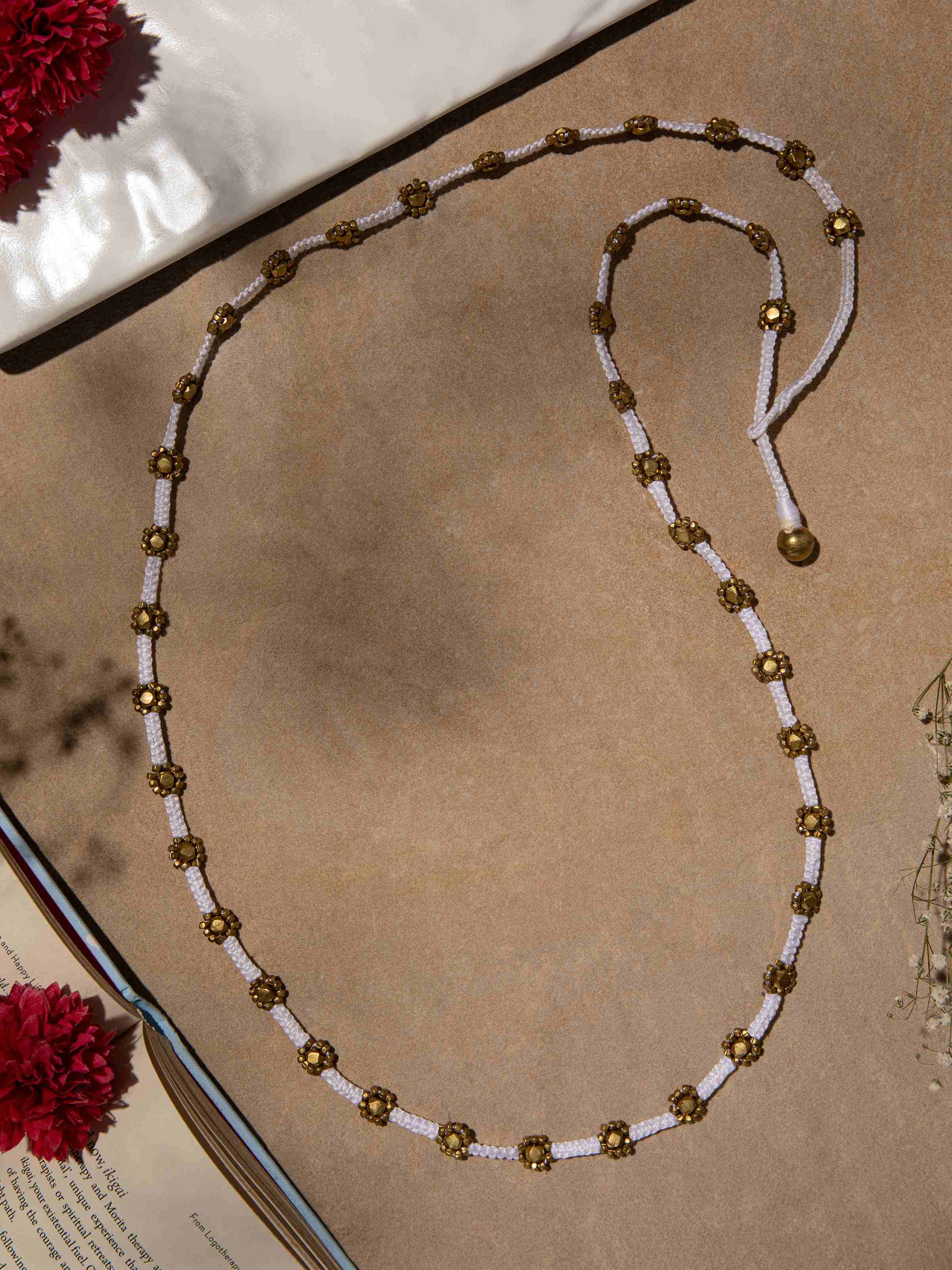 Side view of Dhokra Long Necklace emphasizing its elegant length and traditional design.