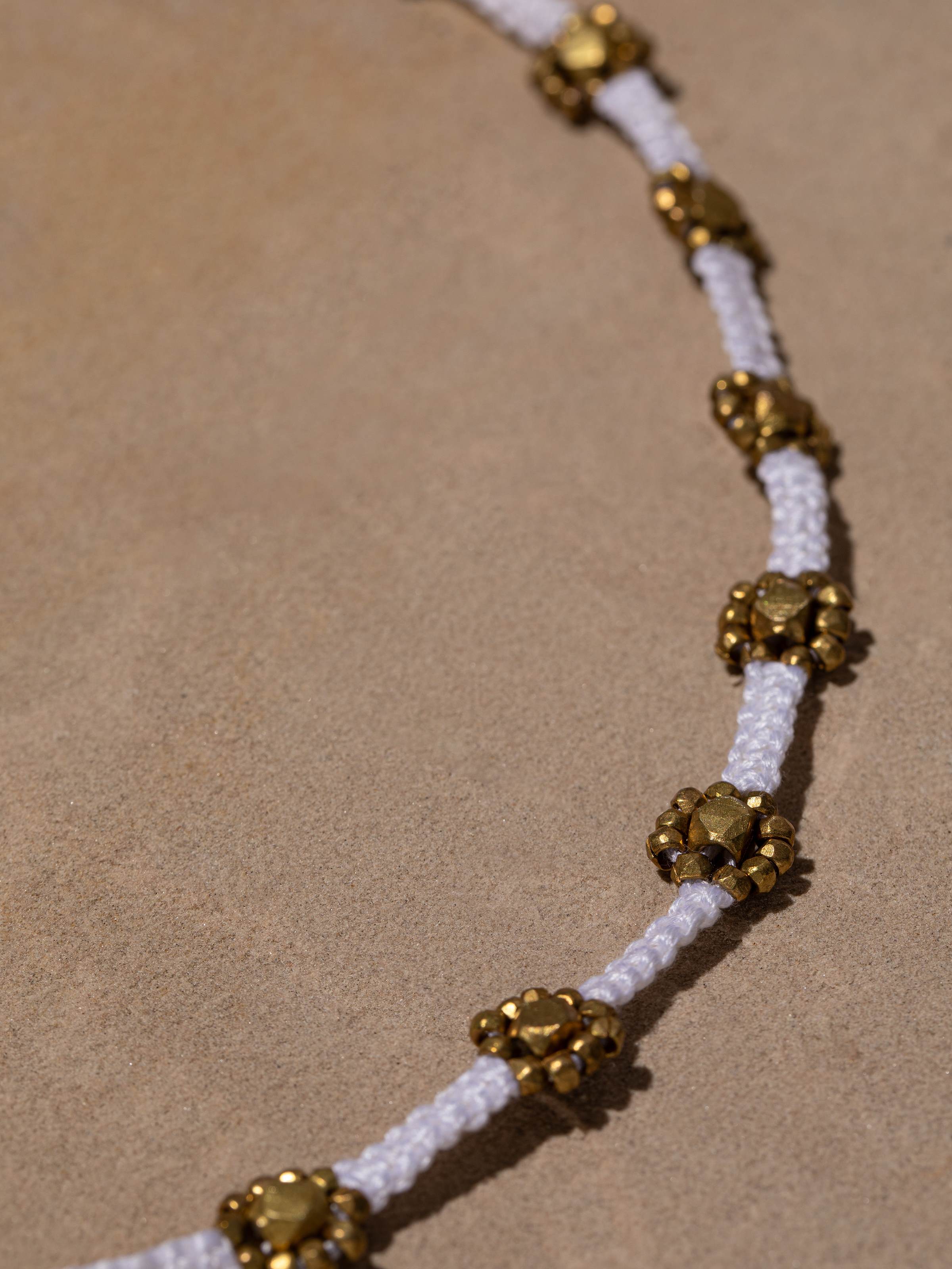 Detailed view of Dhokra Long Necklace highlighting the intricate details and traditional design.