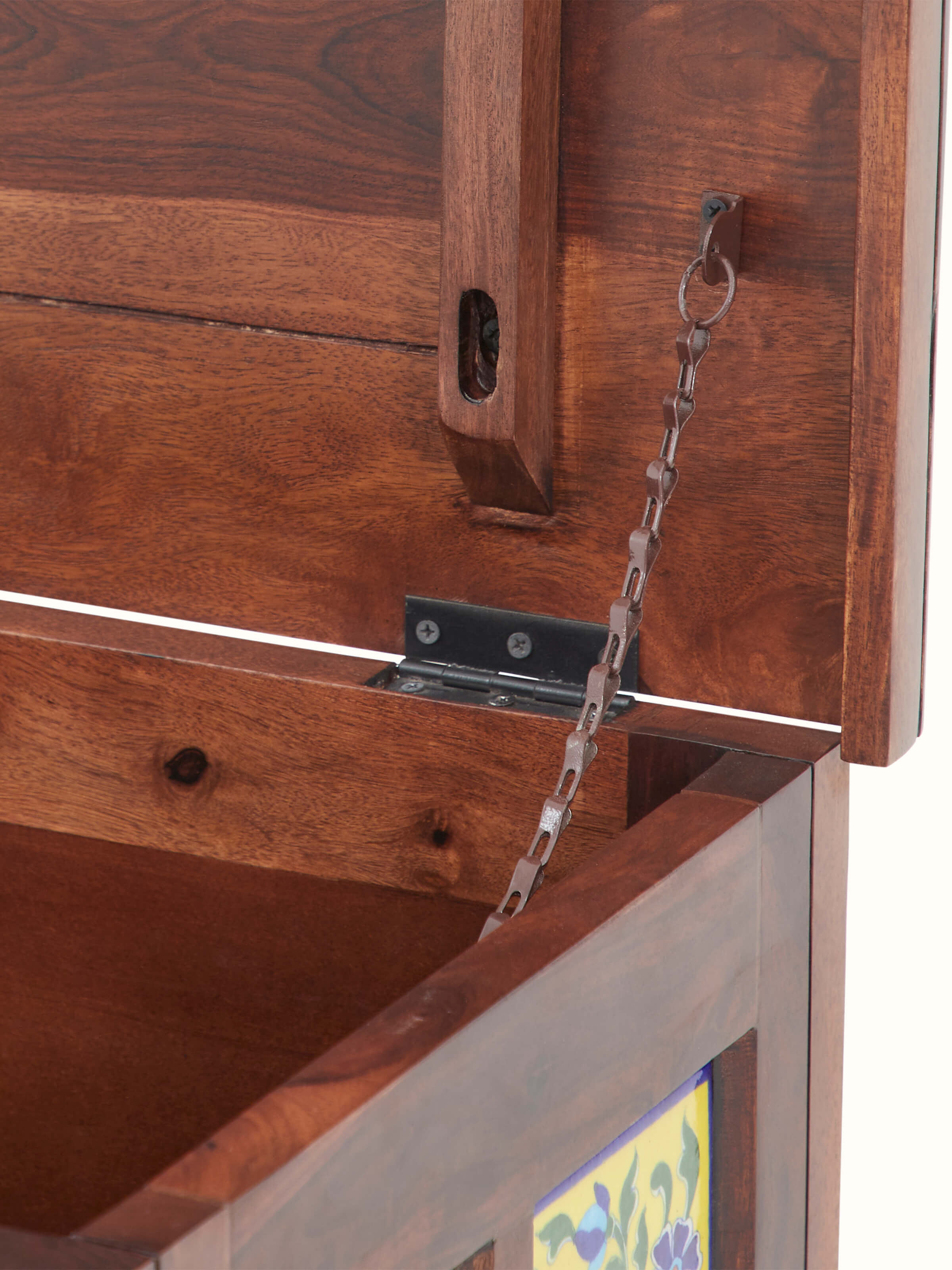 Close-up of the blue pottery work on the Sheesham wood trunk, highlighting the fine details and artistic craftsmanship.