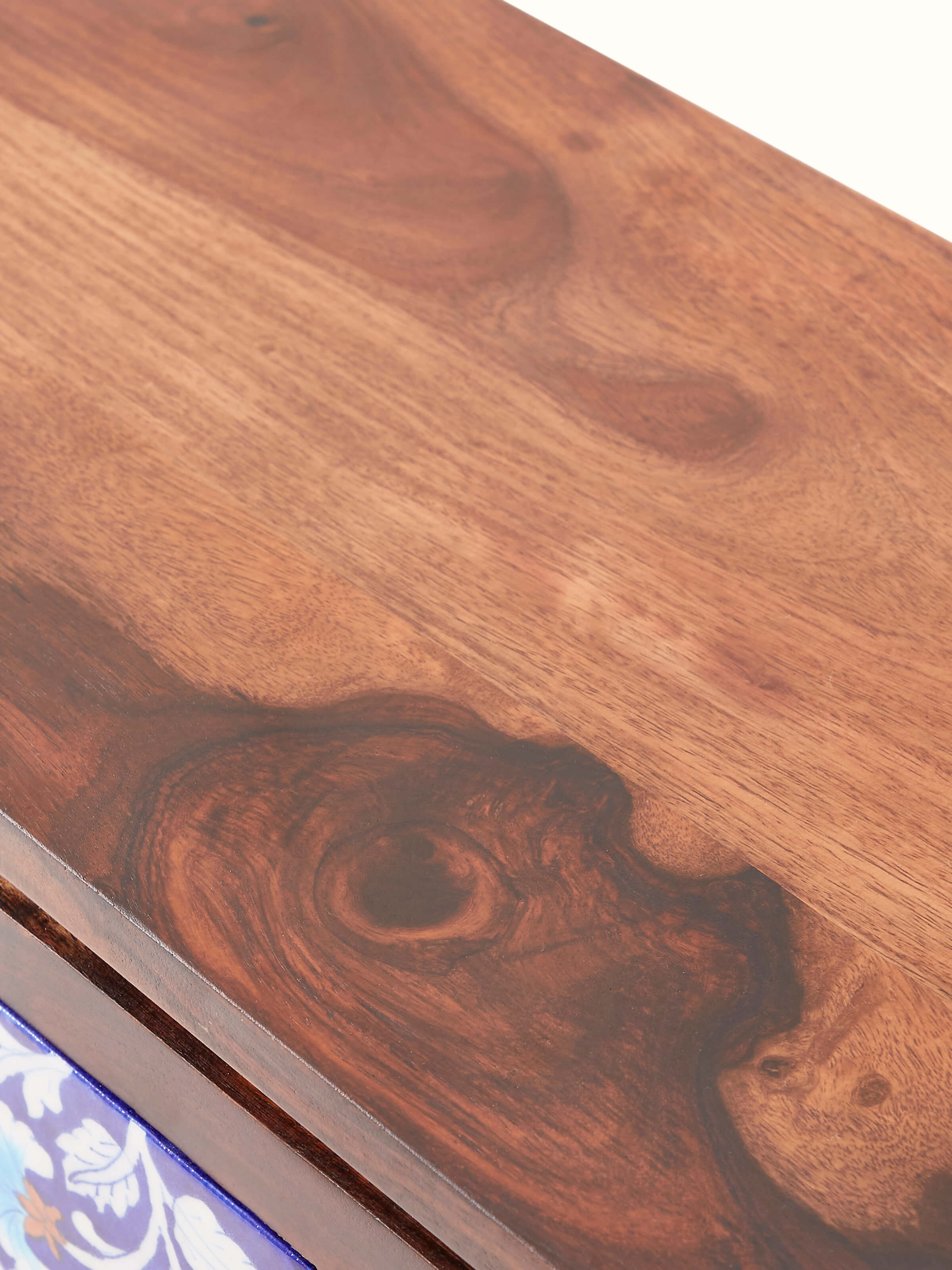 Back view of Sheesham wood blue pottery wall shelf (2 doors) displaying solid craftsmanship