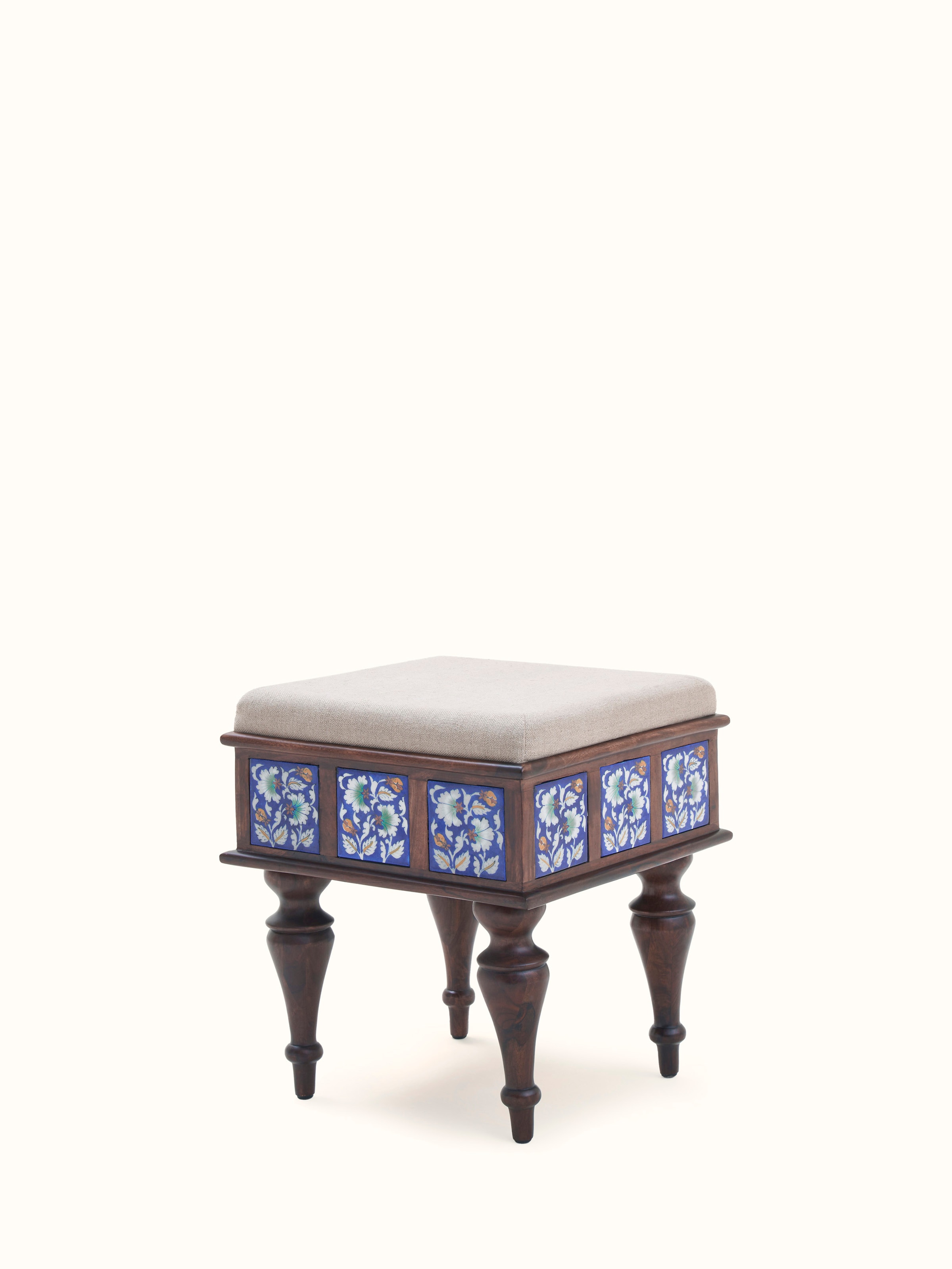 Top view of Sheesham wood blue pottery upholstered stool, emphasizing the blue pottery pattern