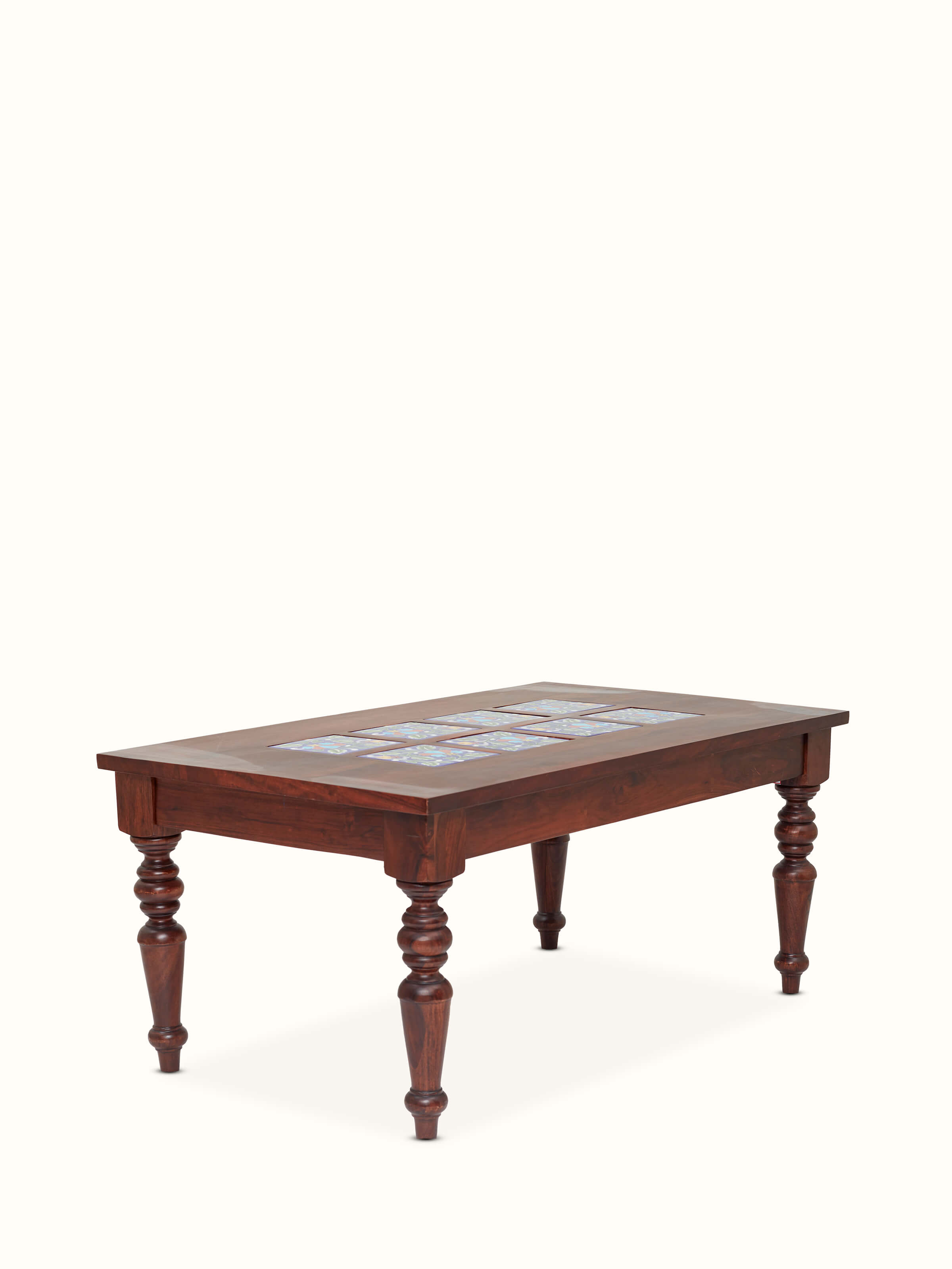 Close-up view of the blue pottery on the Sheesham wood coffee table set, focusing on the detailed blue patterns.