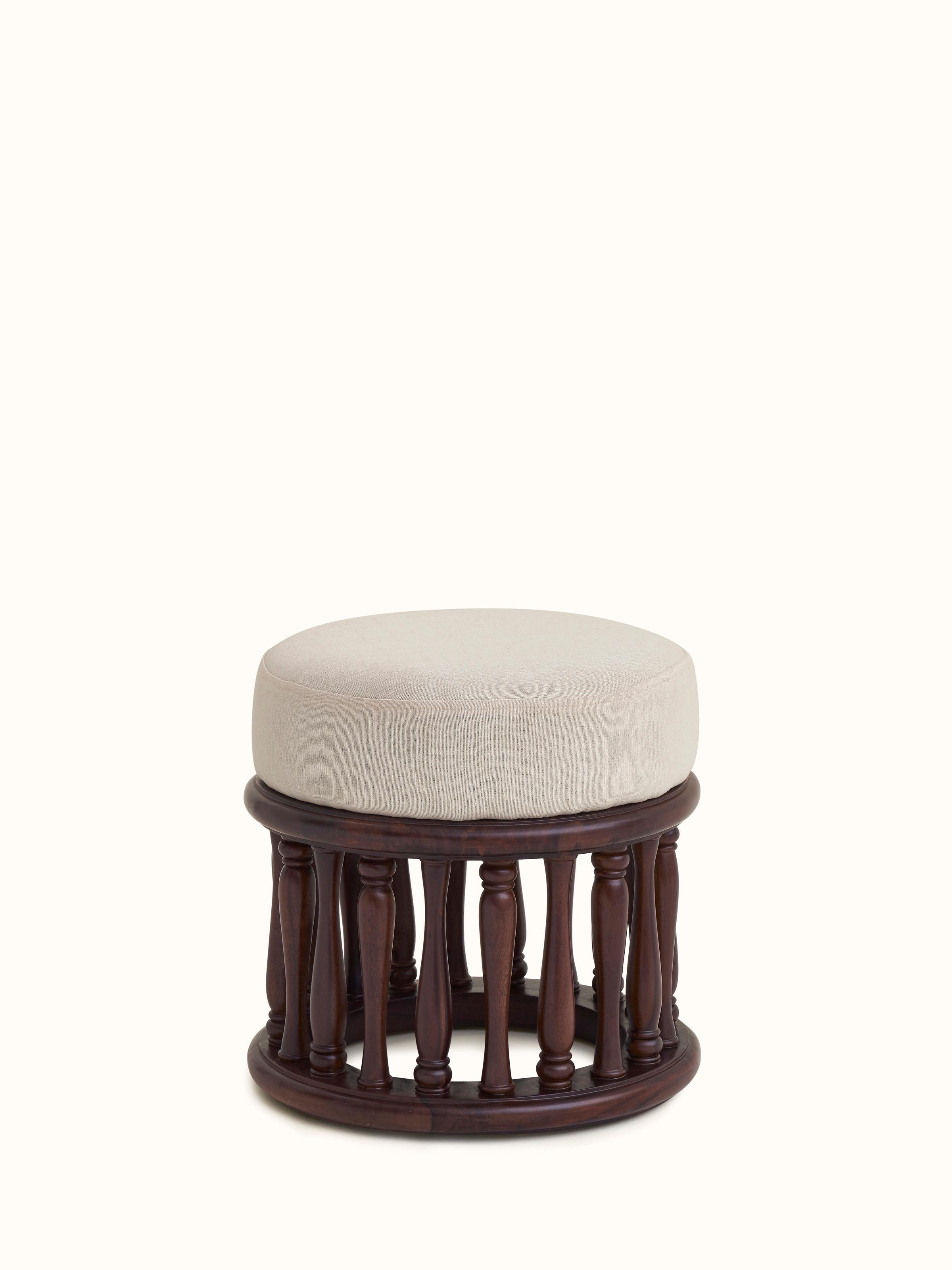Front view of upholstered Sheesham wood round pouffe, featuring a plush, fabric-covered top and sturdy wooden base