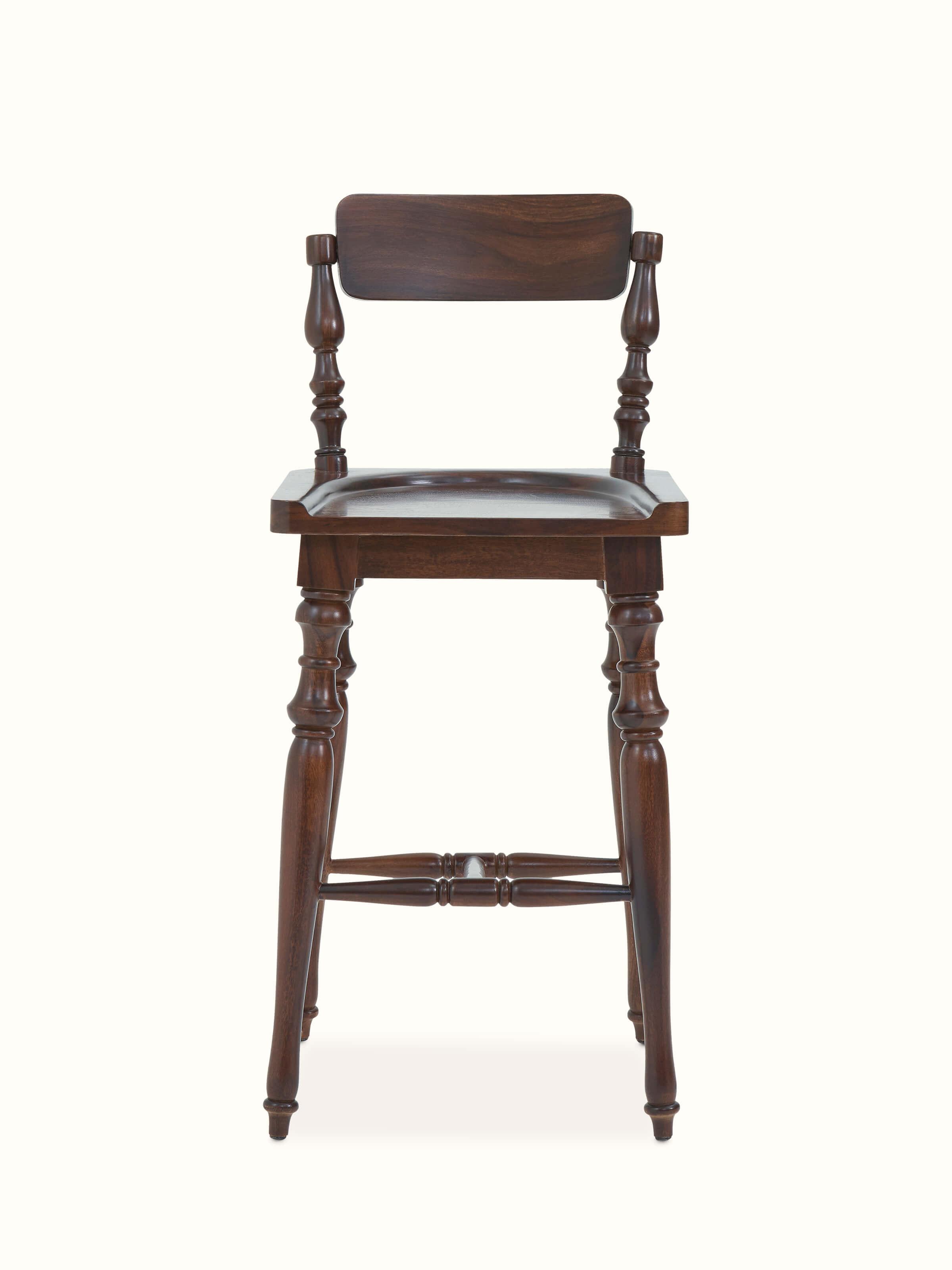 Front view of Sheesham wood bar stool, highlighting its sleek design and natural wood finish.