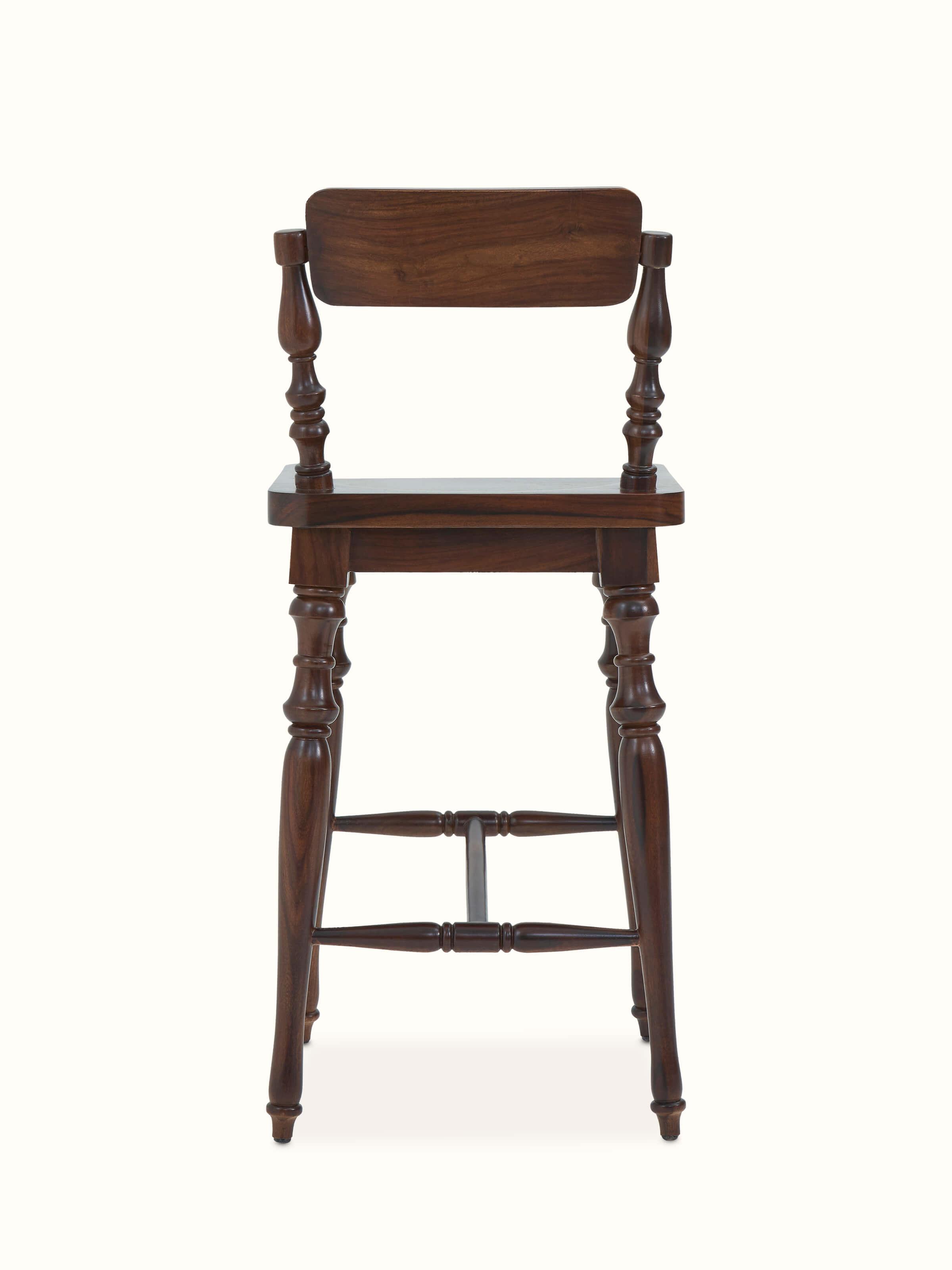 Detailed view of the Sheesham wood bar stool's seat and backrest, showing the quality of the woodwork.