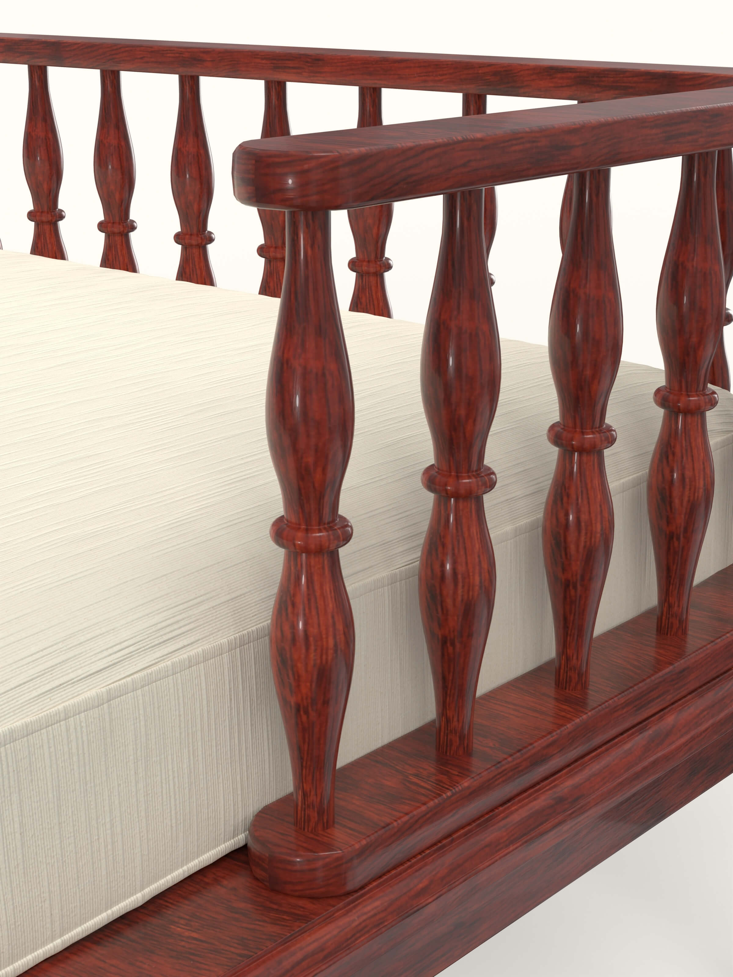 Close-up view of honey finish upholstered sheesham wood daybed focusing on upholstery and grain