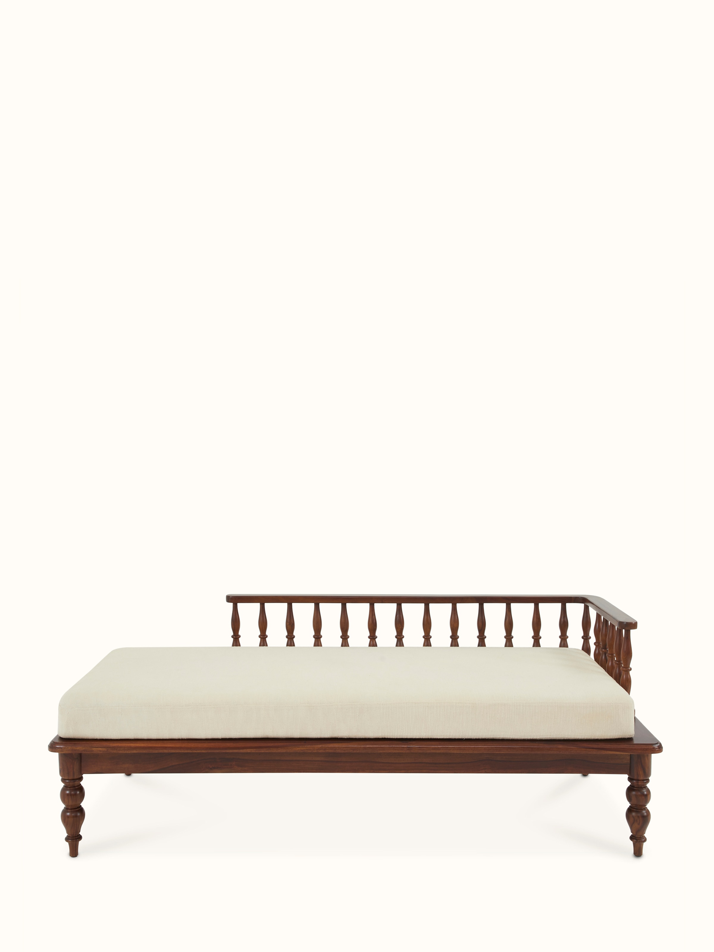 Front view of Teak finish upholstered Sheesham wood daybed showcasing the elegant design and comfortable upholstery