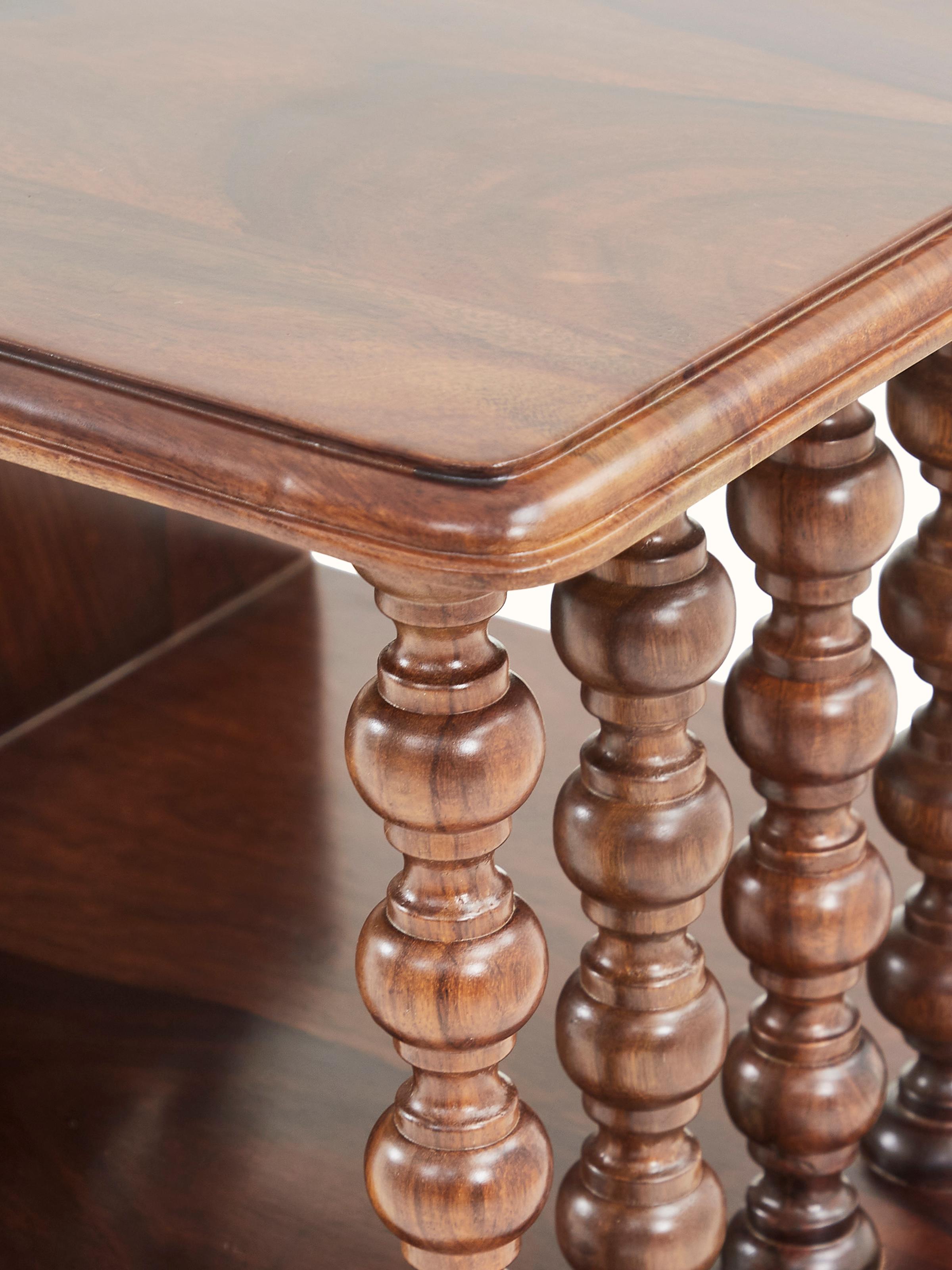 Close-up of Sheesham wood entertainment unit’s detailed craftsmanship and finish, focusing on the quality of the wood