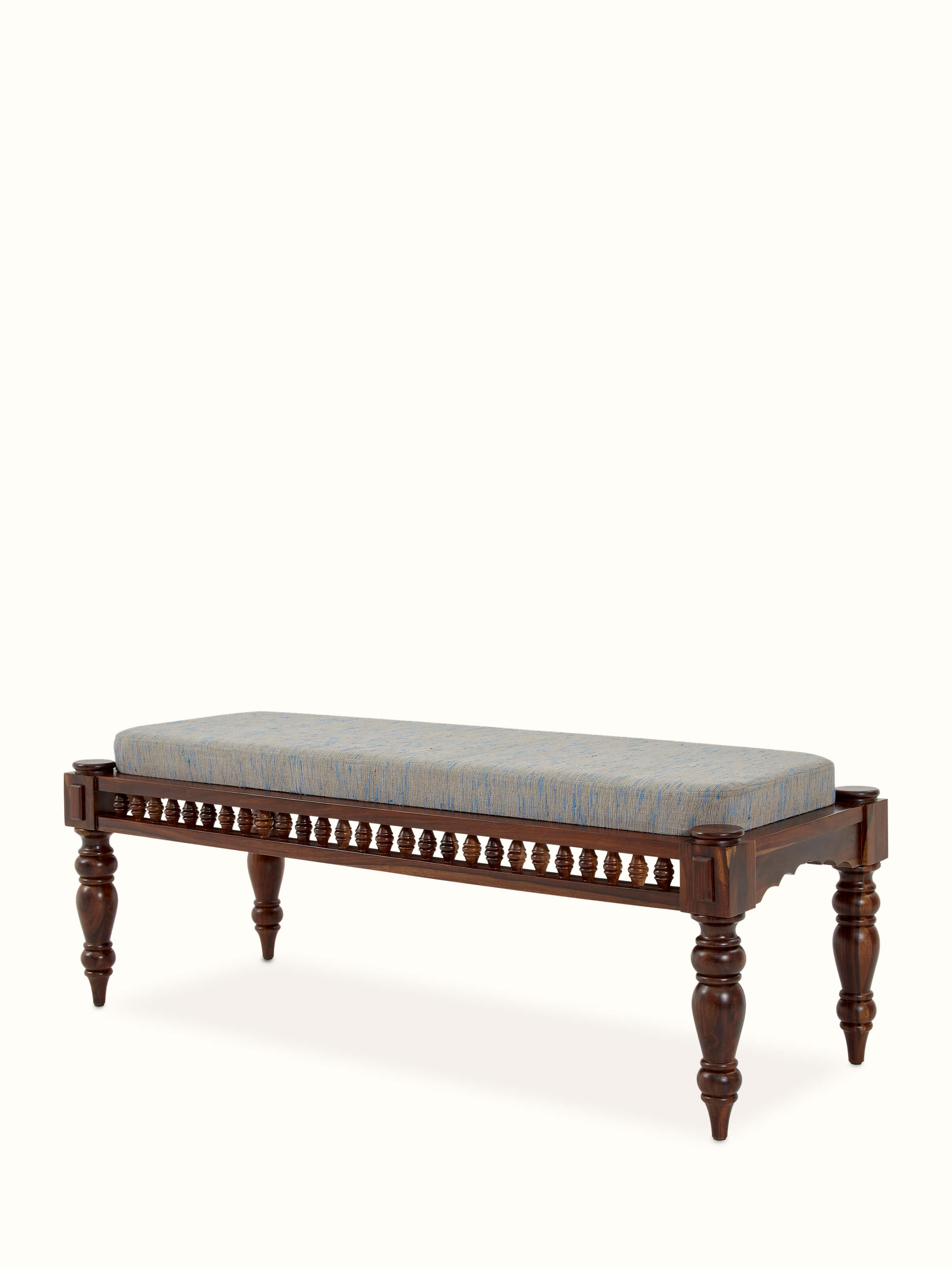 Side view of the upholstered Sheesham wood 2-seater bench, focusing on its design and wood detailing.